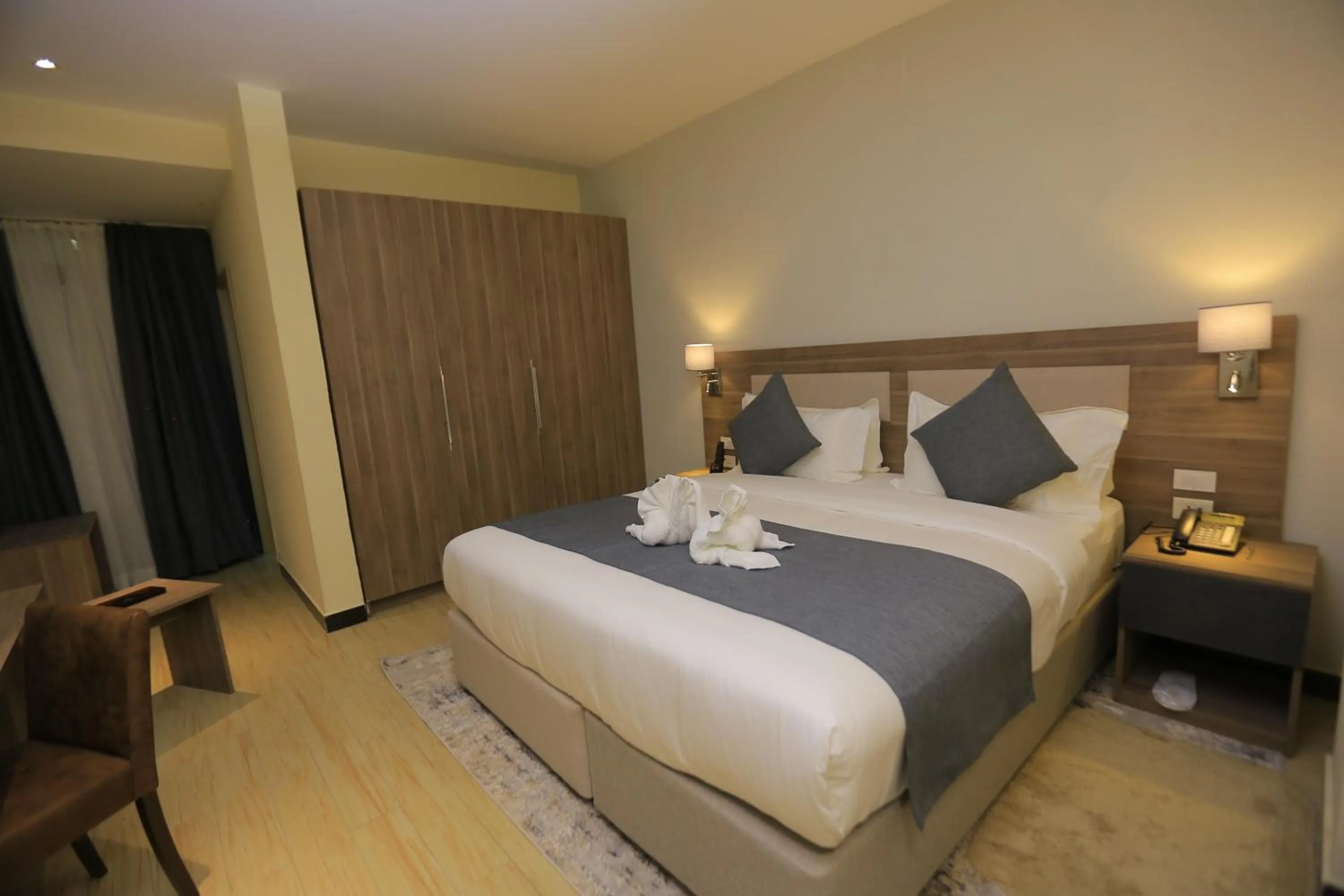 Bed in Triple E Hotel and Spa