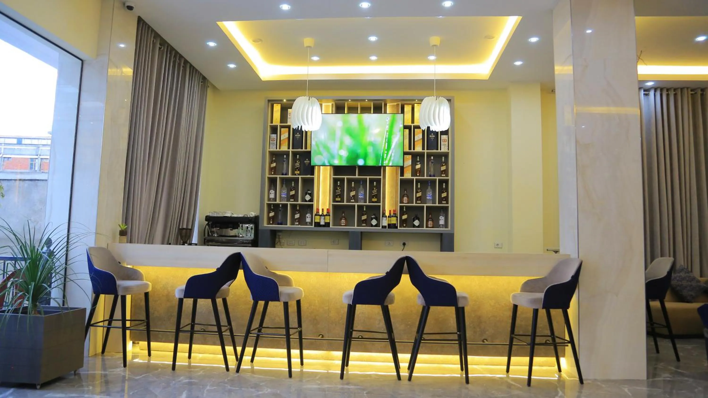 Lounge or bar in Triple E Hotel and Spa