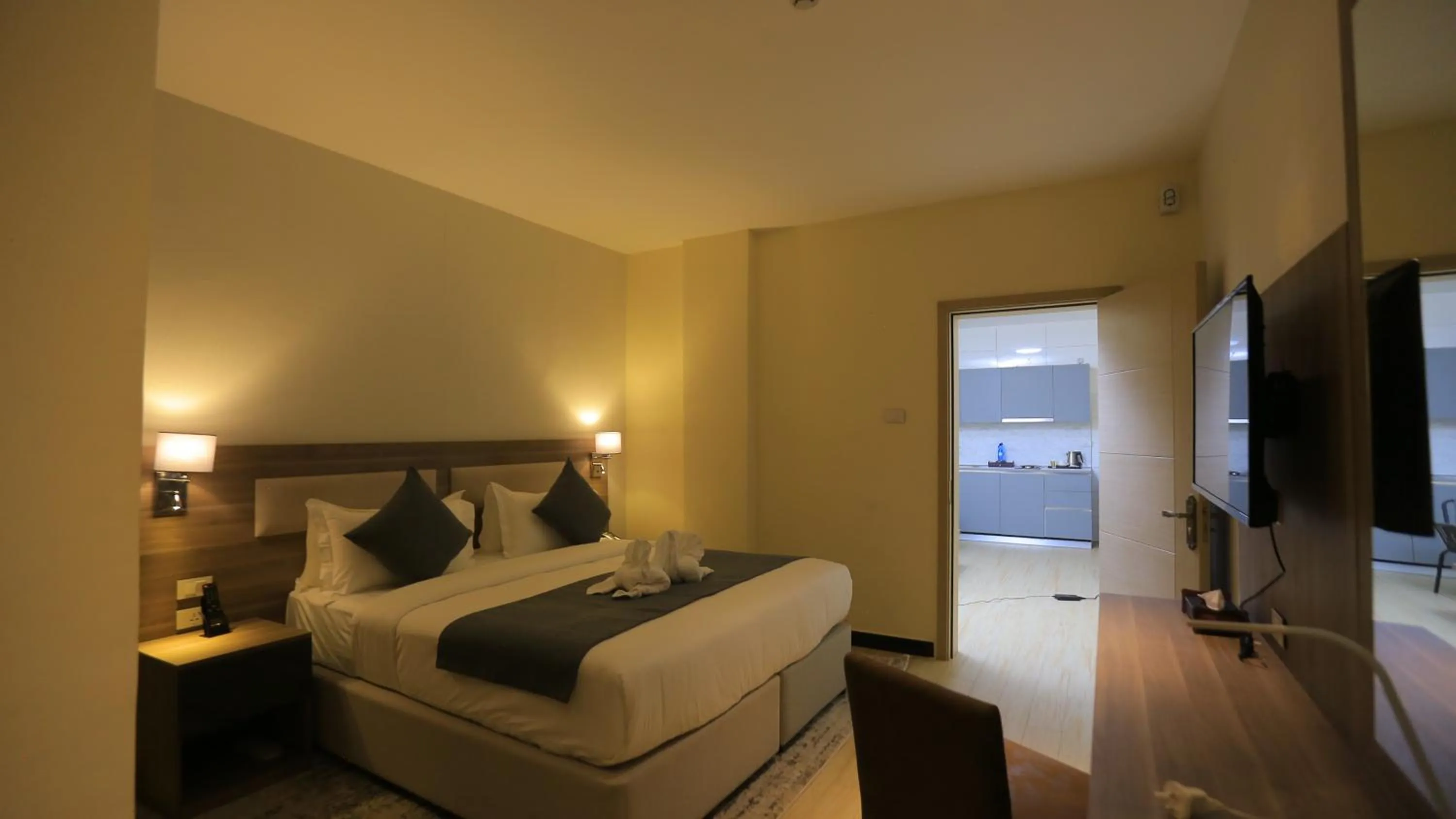 Bed in Triple E Hotel and Spa