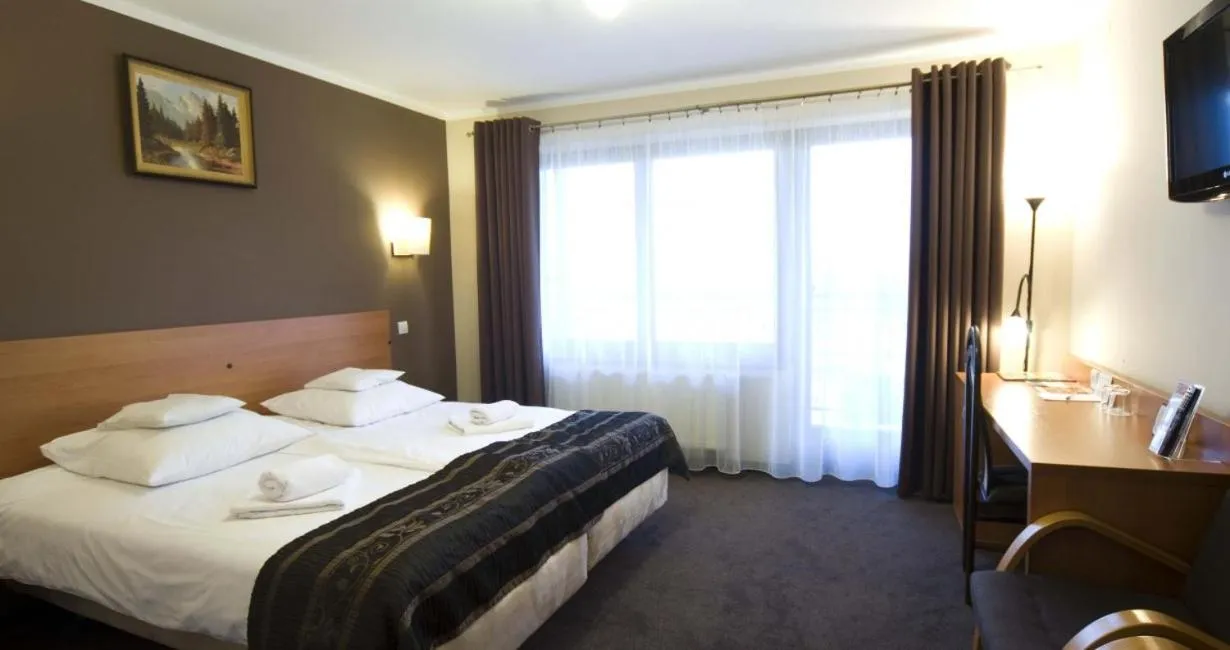 Bed in Hotel Zimnik Luksus Natury Spa & Wellness