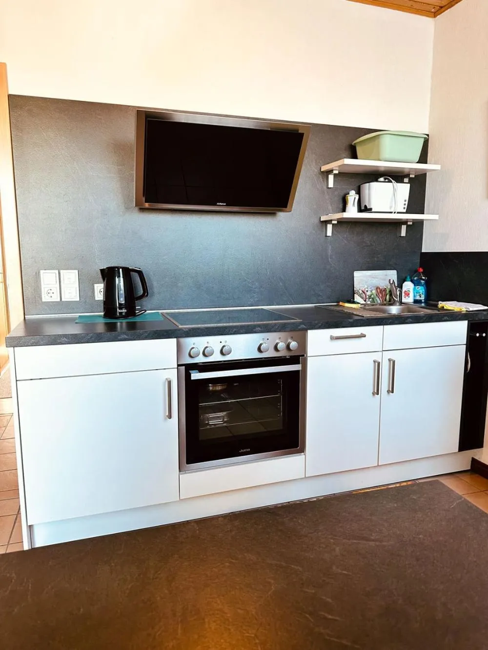Kitchen or kitchenette in Ferienwohnungen Weingut Kilburg