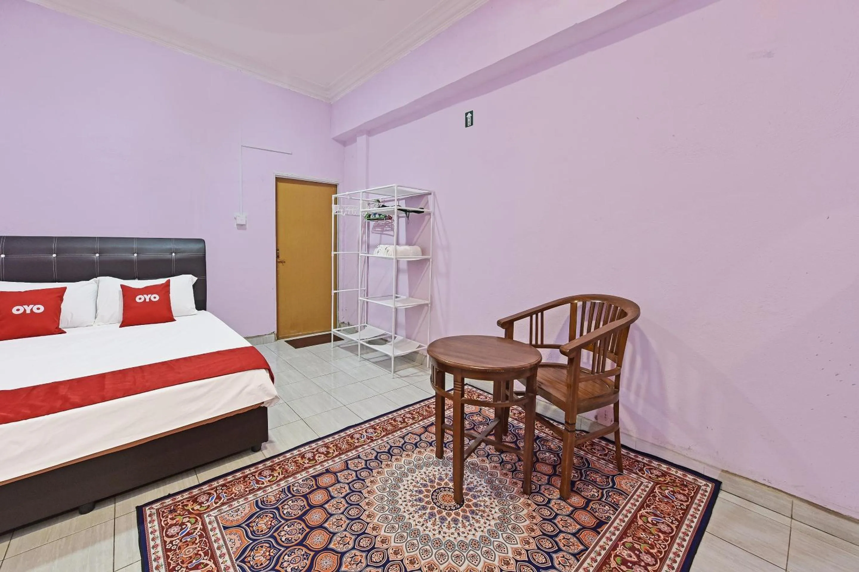 Bedroom, Bed in Hotel O Zn Mix Homestay & Roomstay