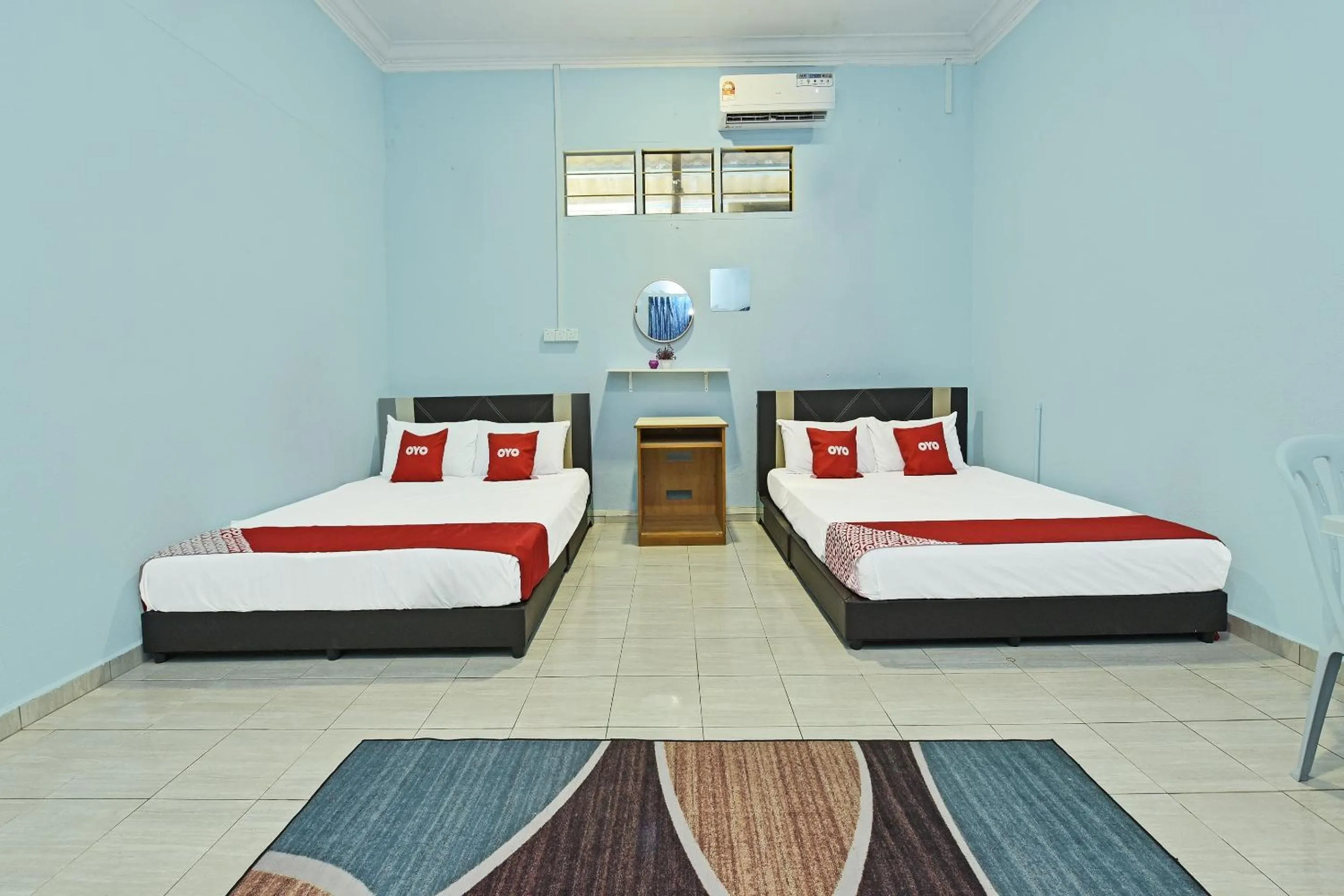 Bedroom, Bed in Hotel O Zn Mix Homestay & Roomstay