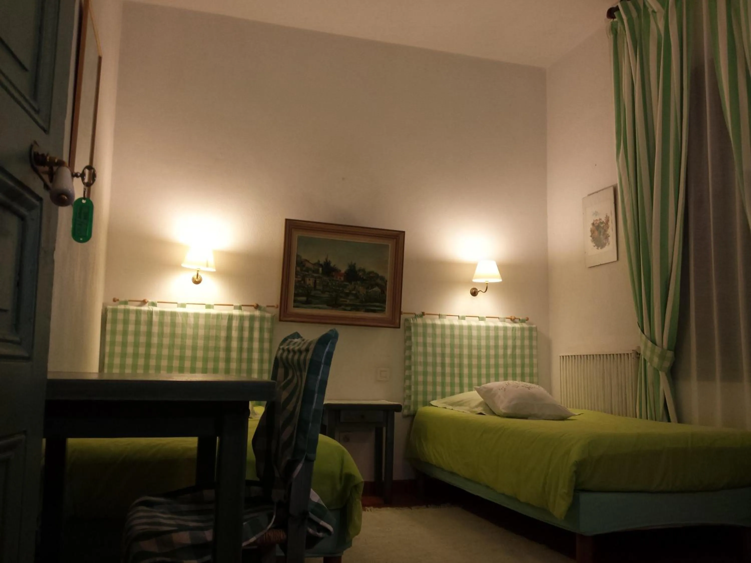 Bedroom in Hôtel Restaurant L'Aiglon