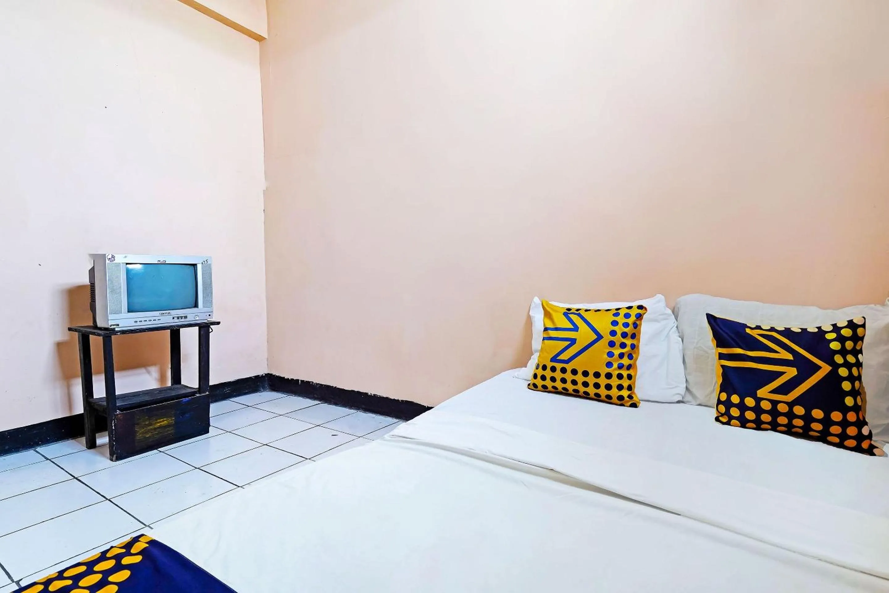 Bedroom in Hotel O Rumah Bundo Syariah