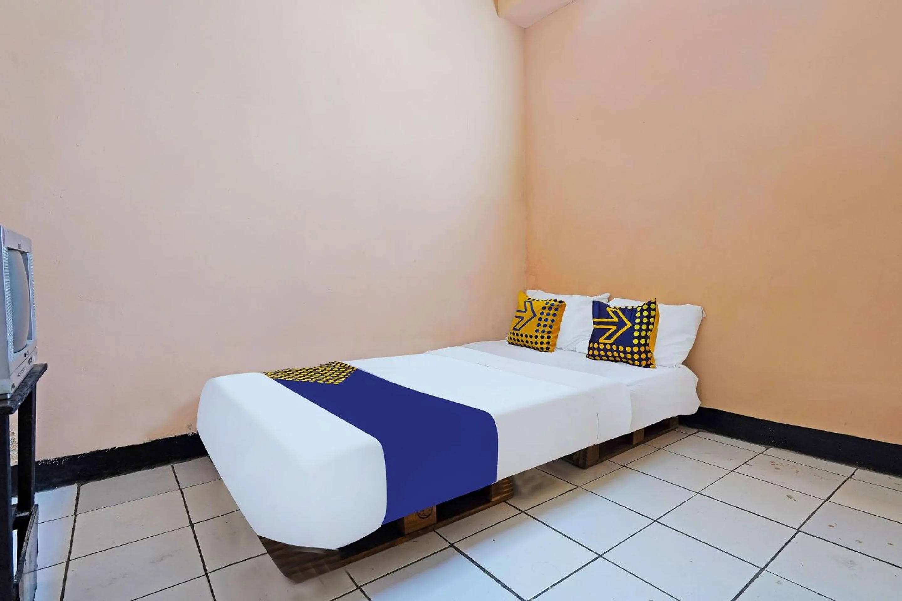 Bedroom in Hotel O Rumah Bundo Syariah