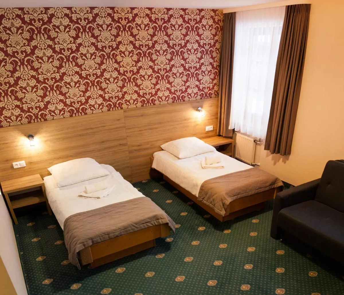 Bed in Hotel Fero Lux