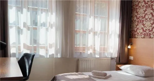 Bed in Hotel Fero Lux