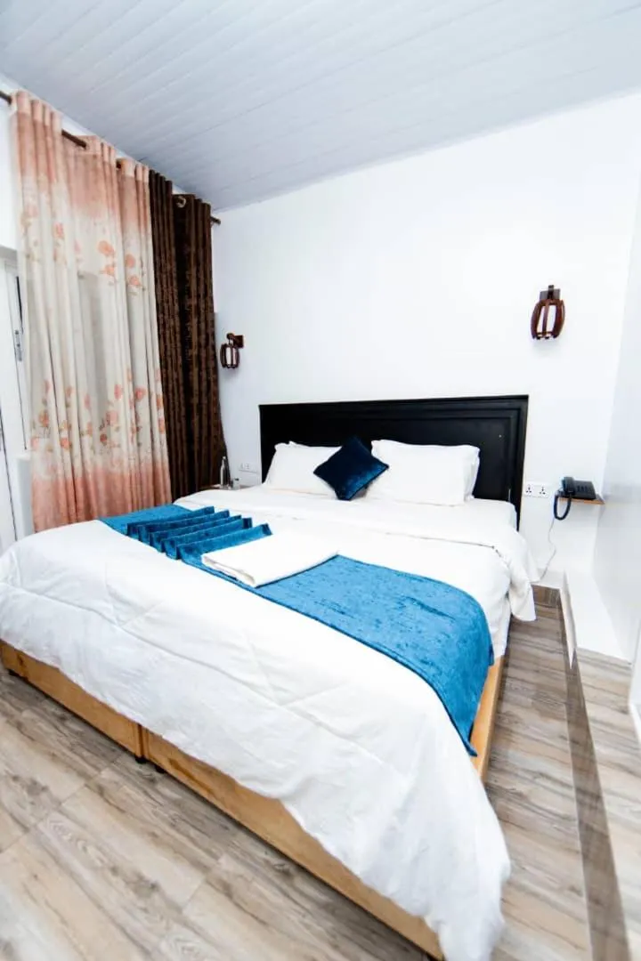 Bedroom, Bed in INZOZI AFRICA HOUSE B&B-Gishushu