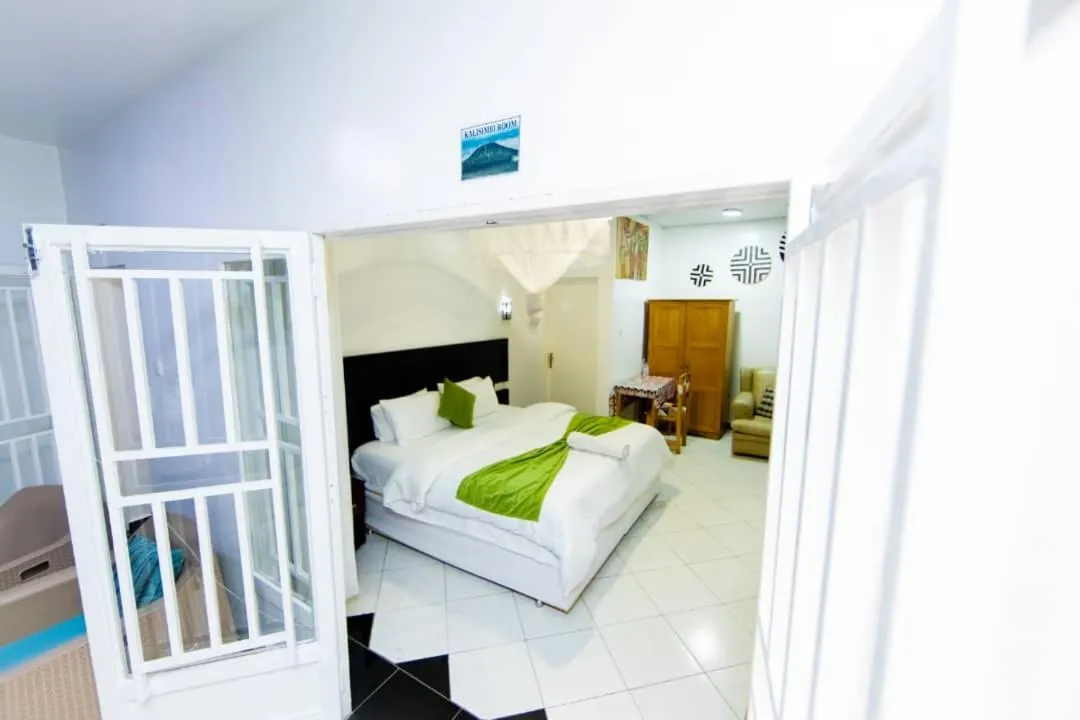 Bedroom, Bed in INZOZI AFRICA HOUSE B&B-Gishushu