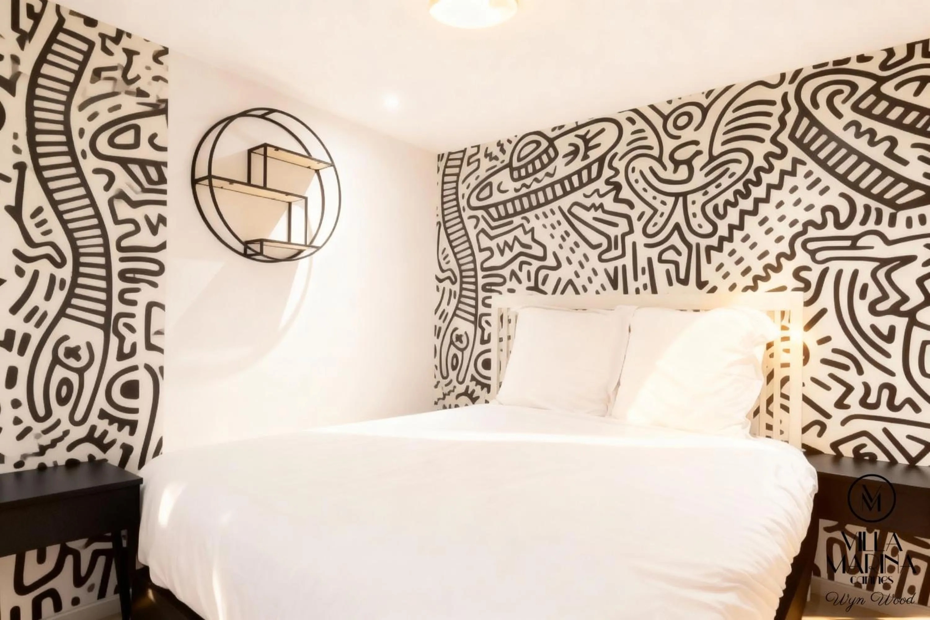 Bed in VILLA MARINA CANNES