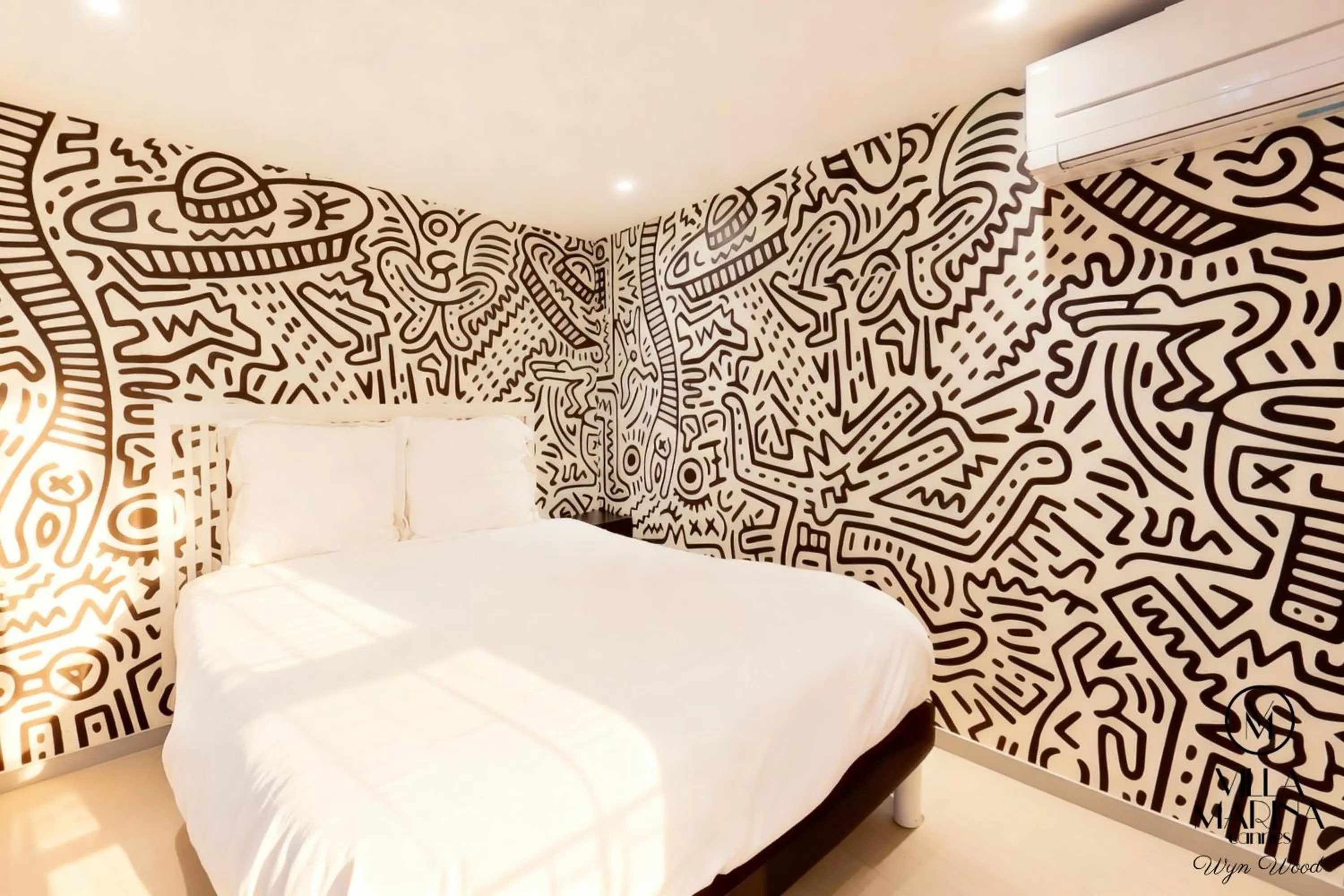 Bed in VILLA MARINA CANNES