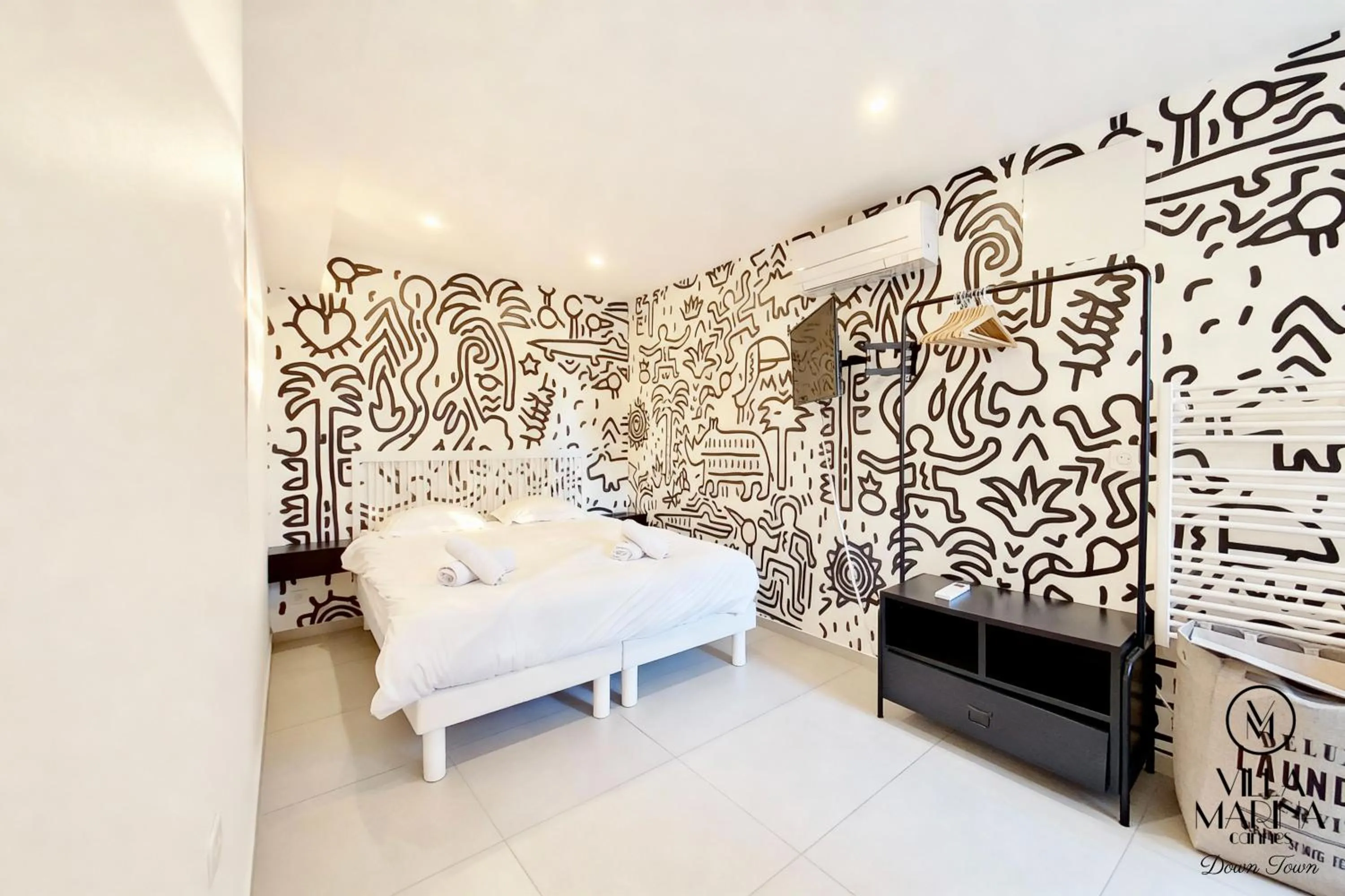 Bed in VILLA MARINA CANNES