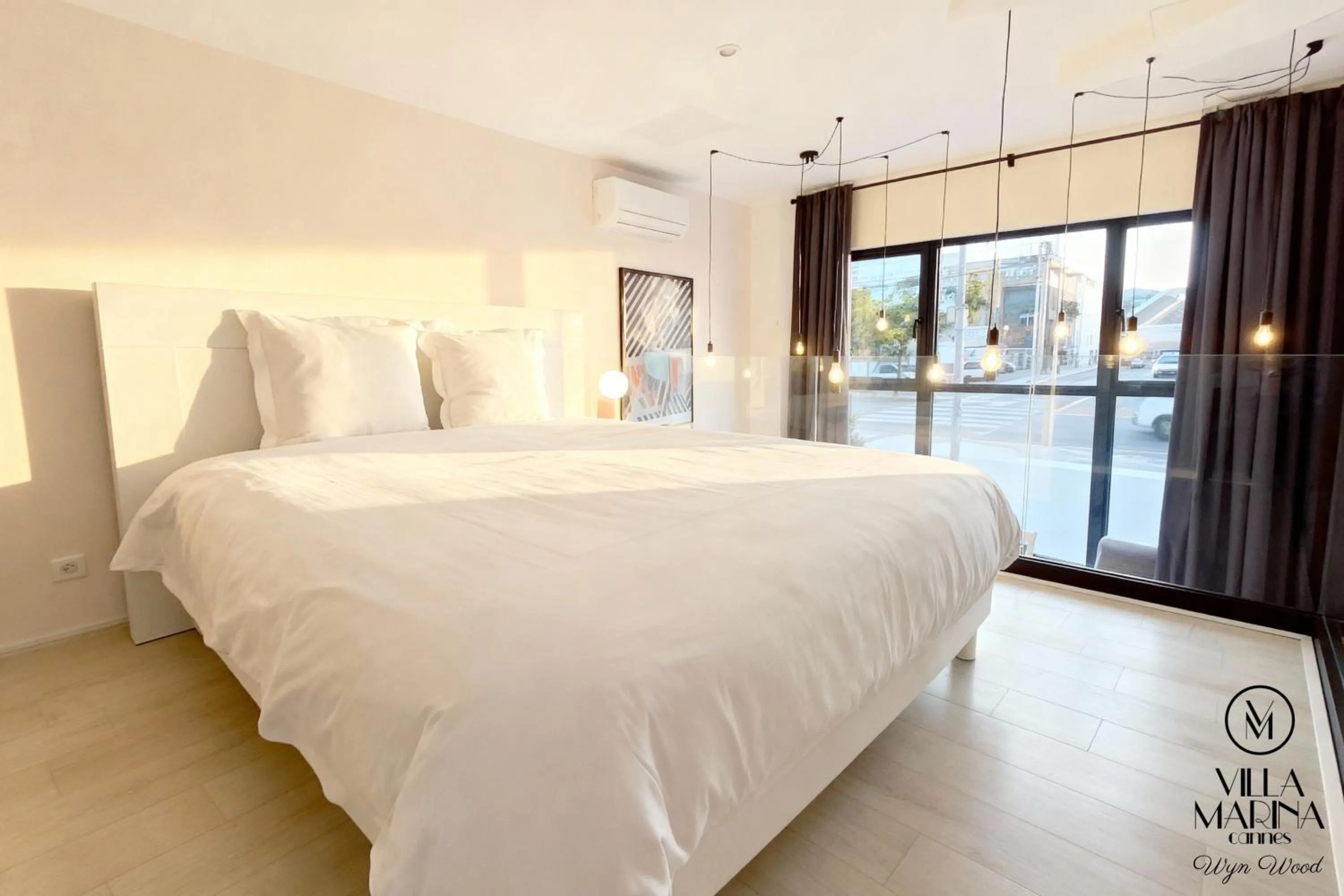 Bed in VILLA MARINA CANNES