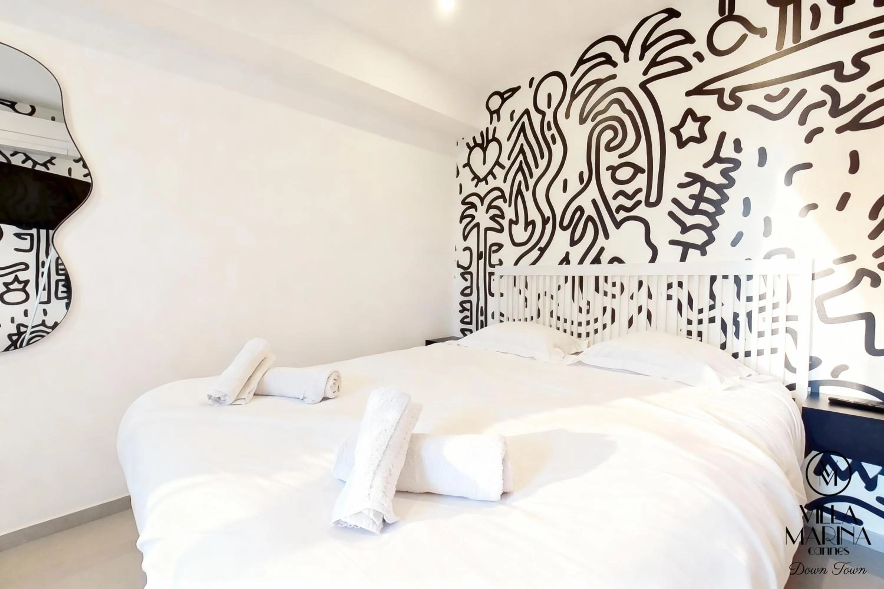 Bed in VILLA MARINA CANNES