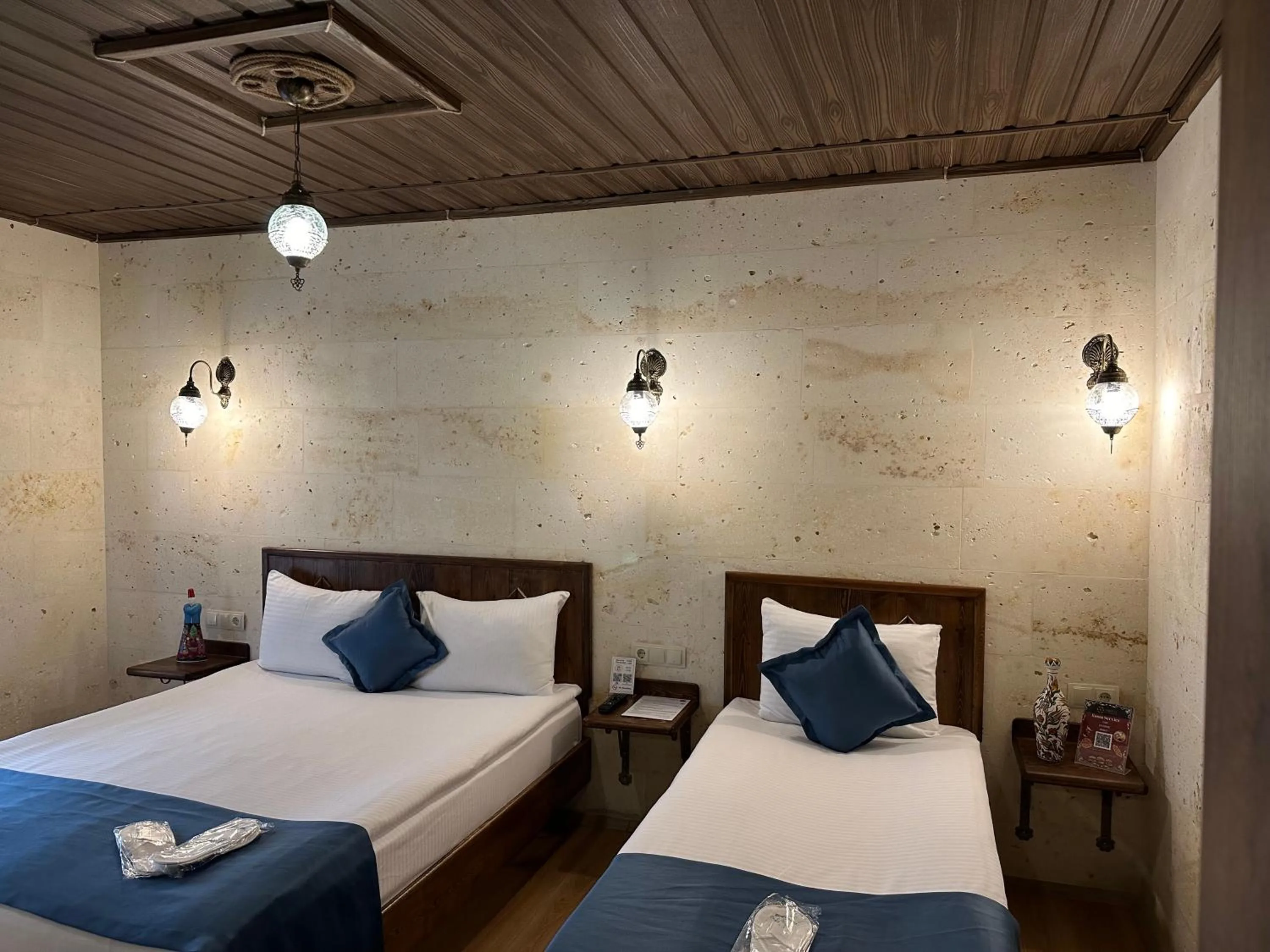 Bed in Virtus Cappadocia Hotel Göreme