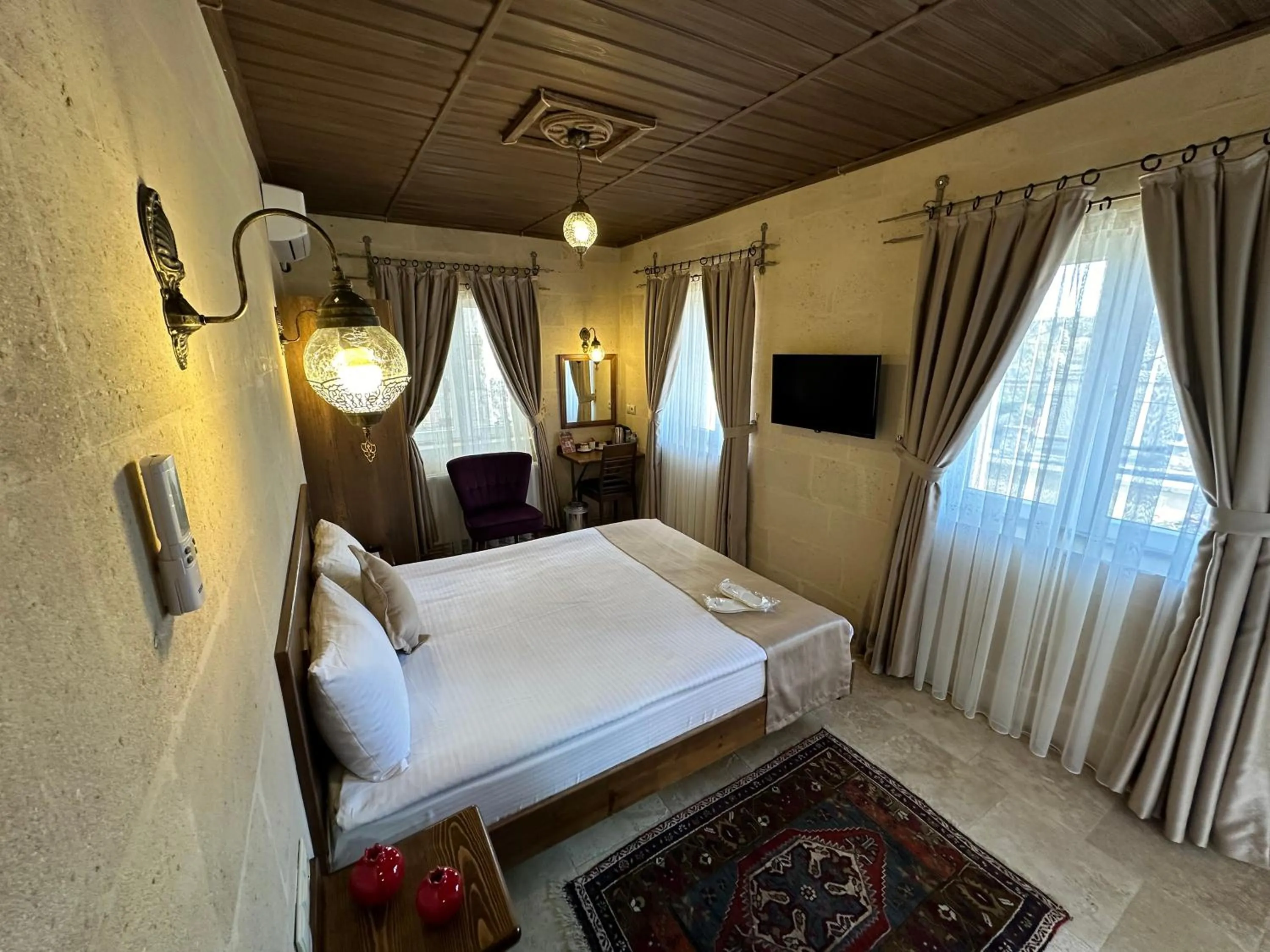 Bed in Virtus Cappadocia Hotel Göreme