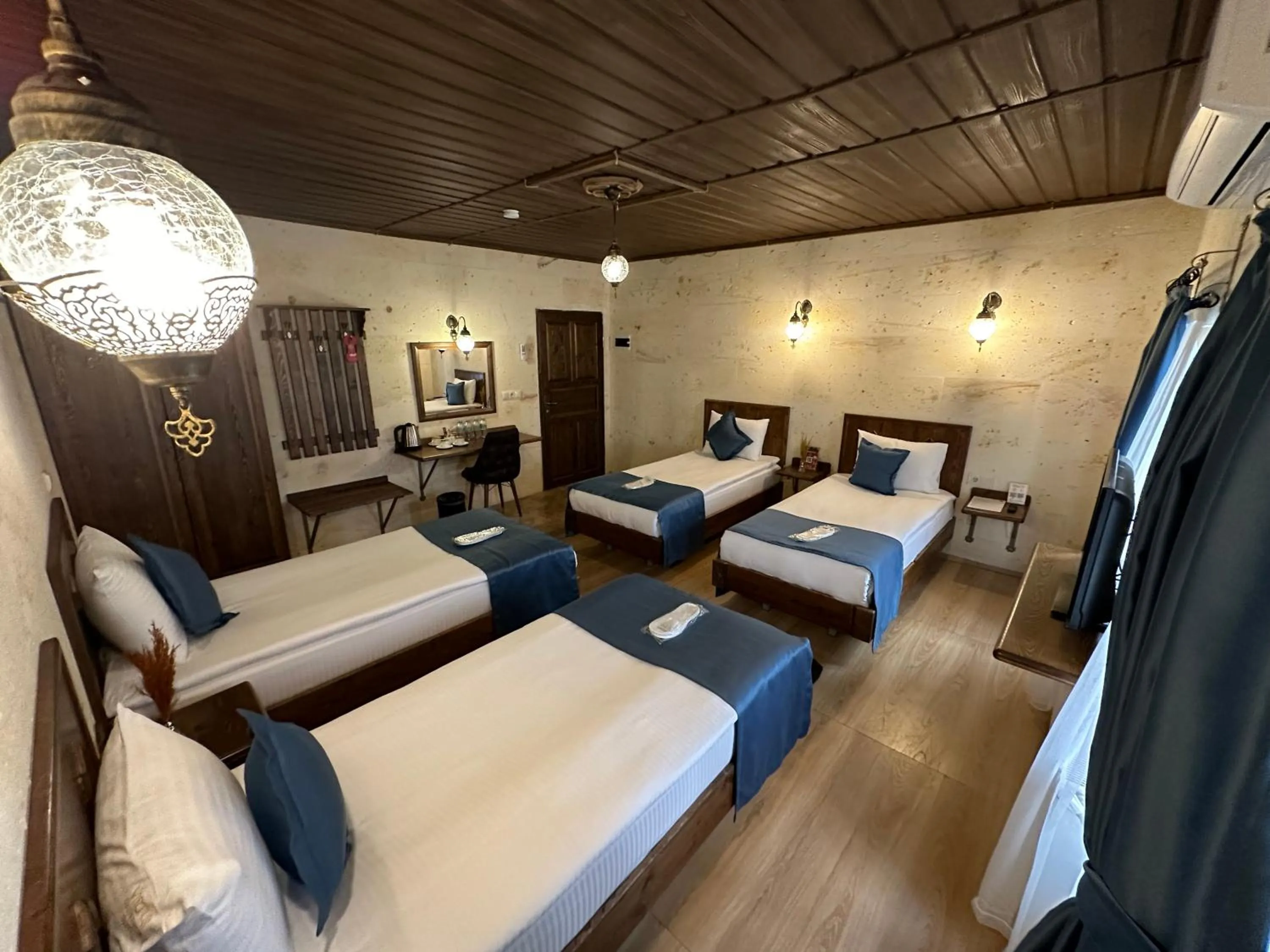 Bed in Virtus Cappadocia Hotel Göreme