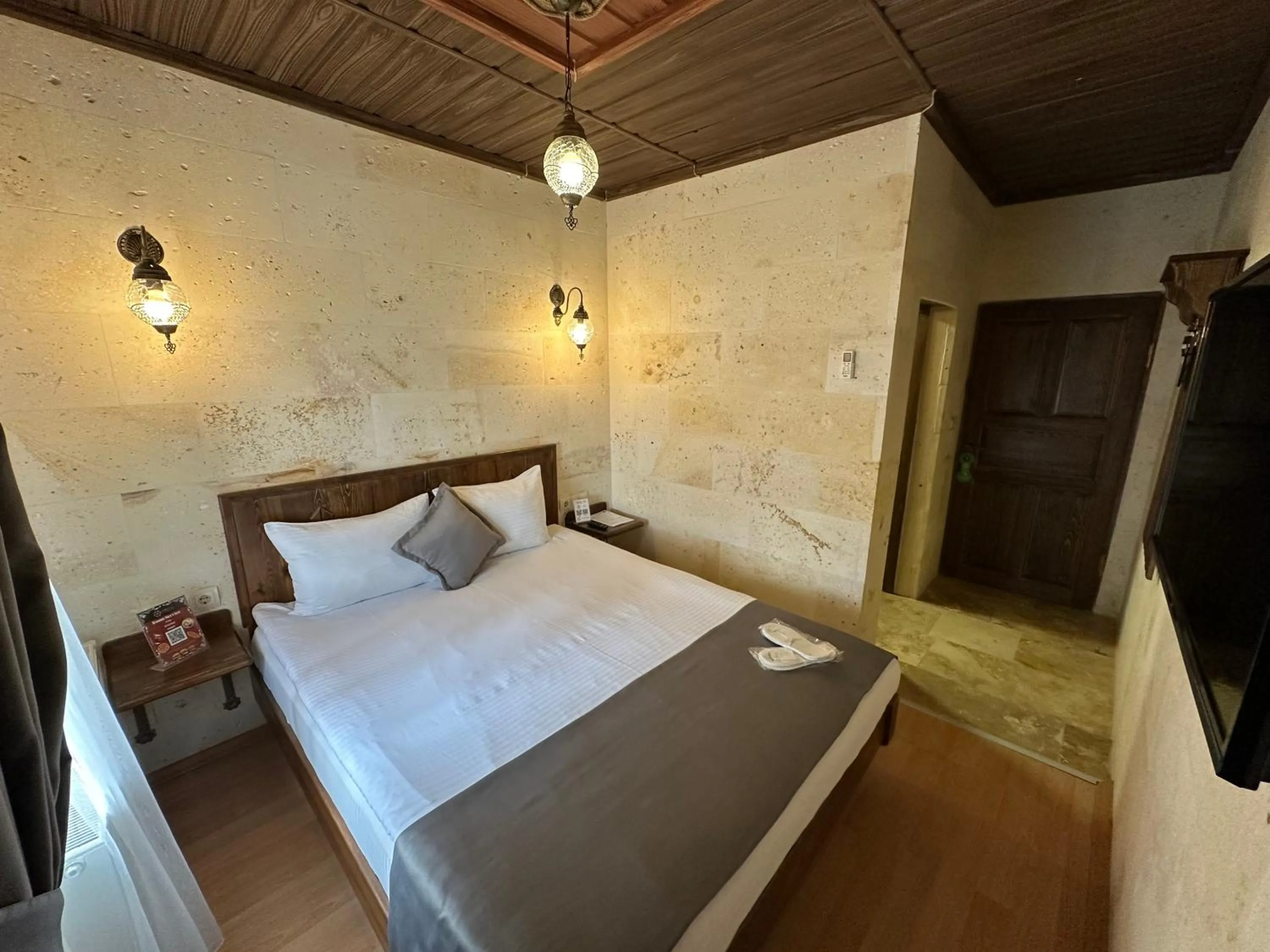 Bed in Virtus Cappadocia Hotel Göreme