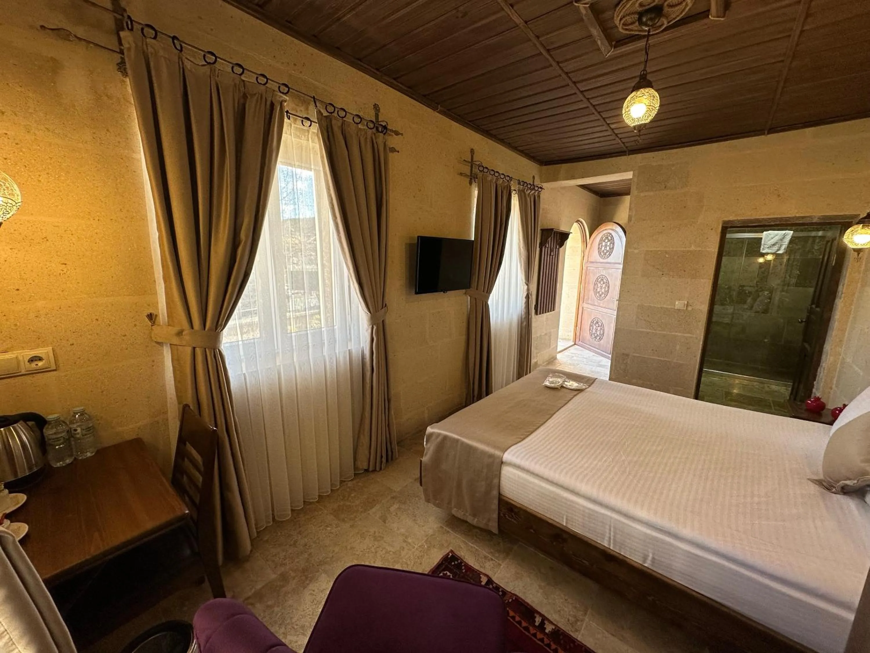 Bed in Virtus Cappadocia Hotel Göreme