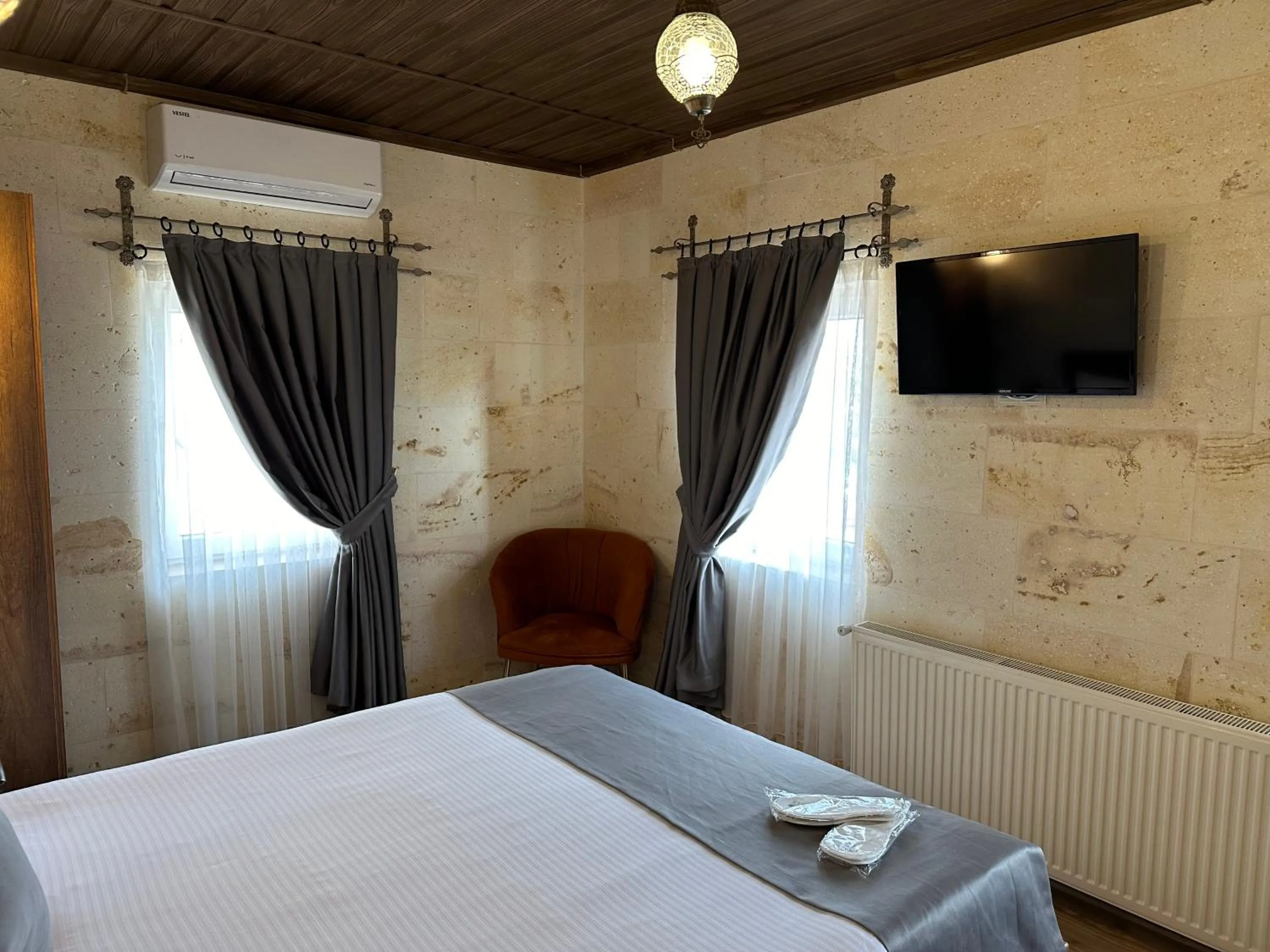 Bed in Virtus Cappadocia Hotel Göreme