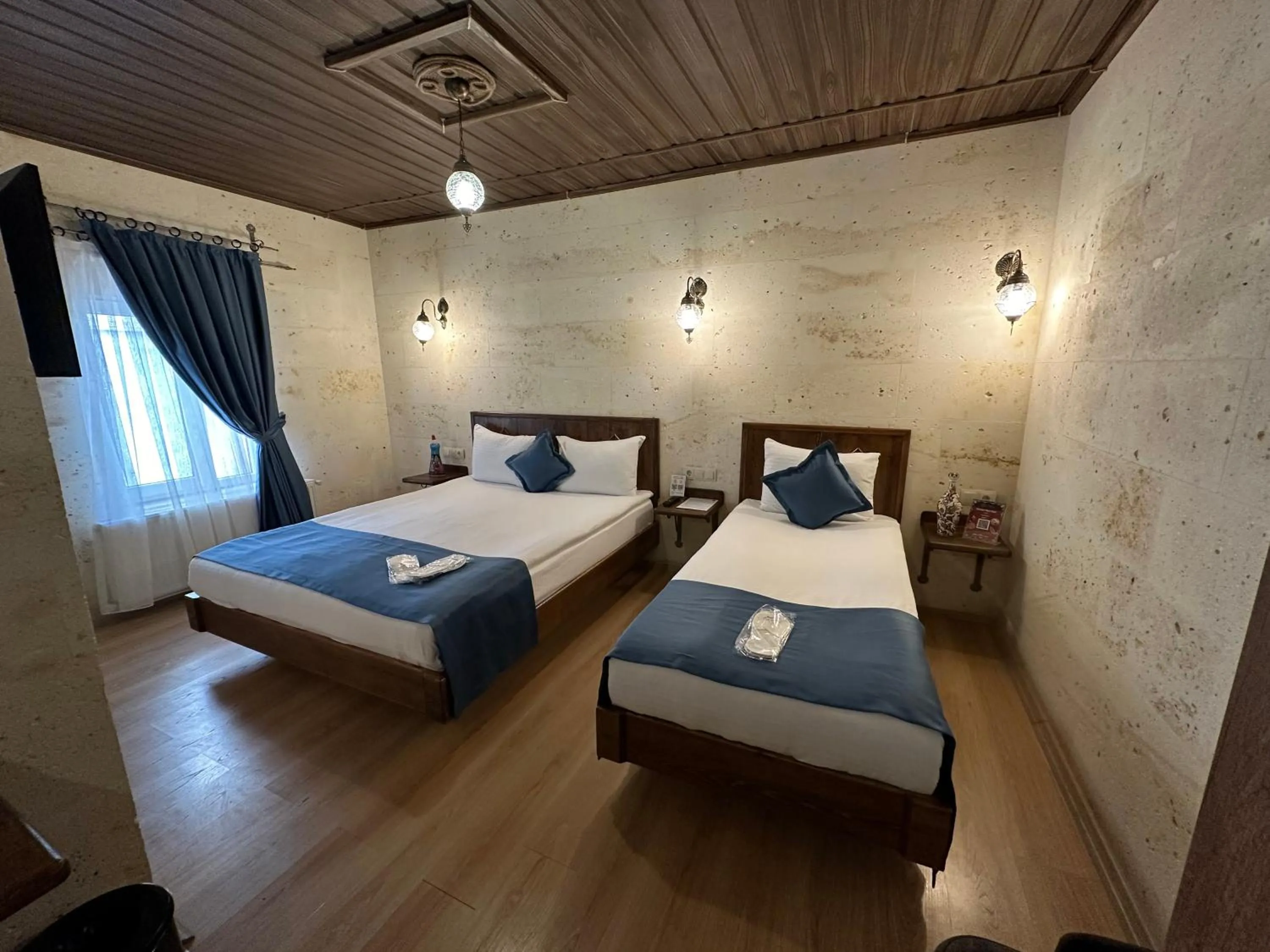 Bed in Virtus Cappadocia Hotel Göreme