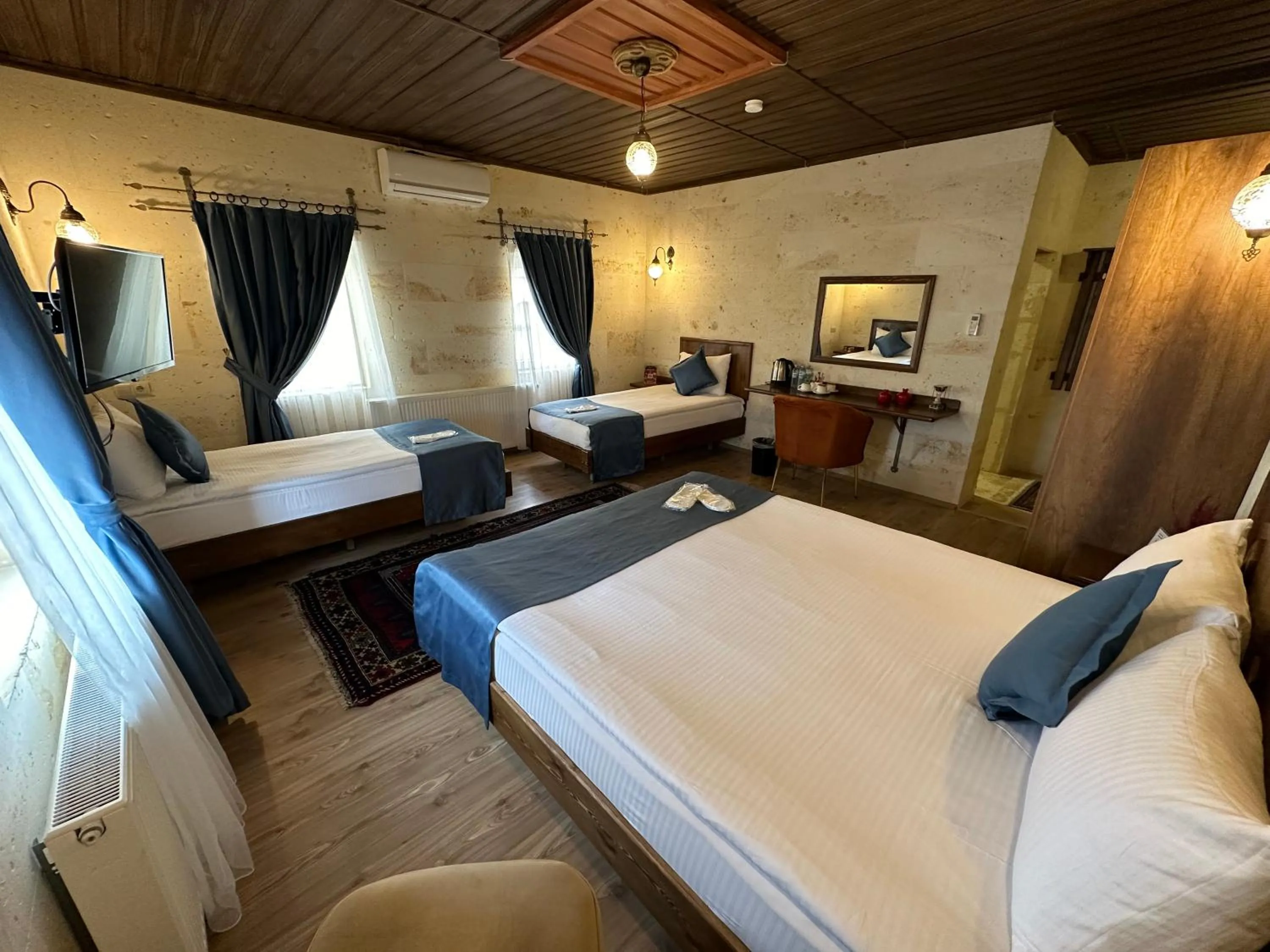 Bed in Virtus Cappadocia Hotel Göreme