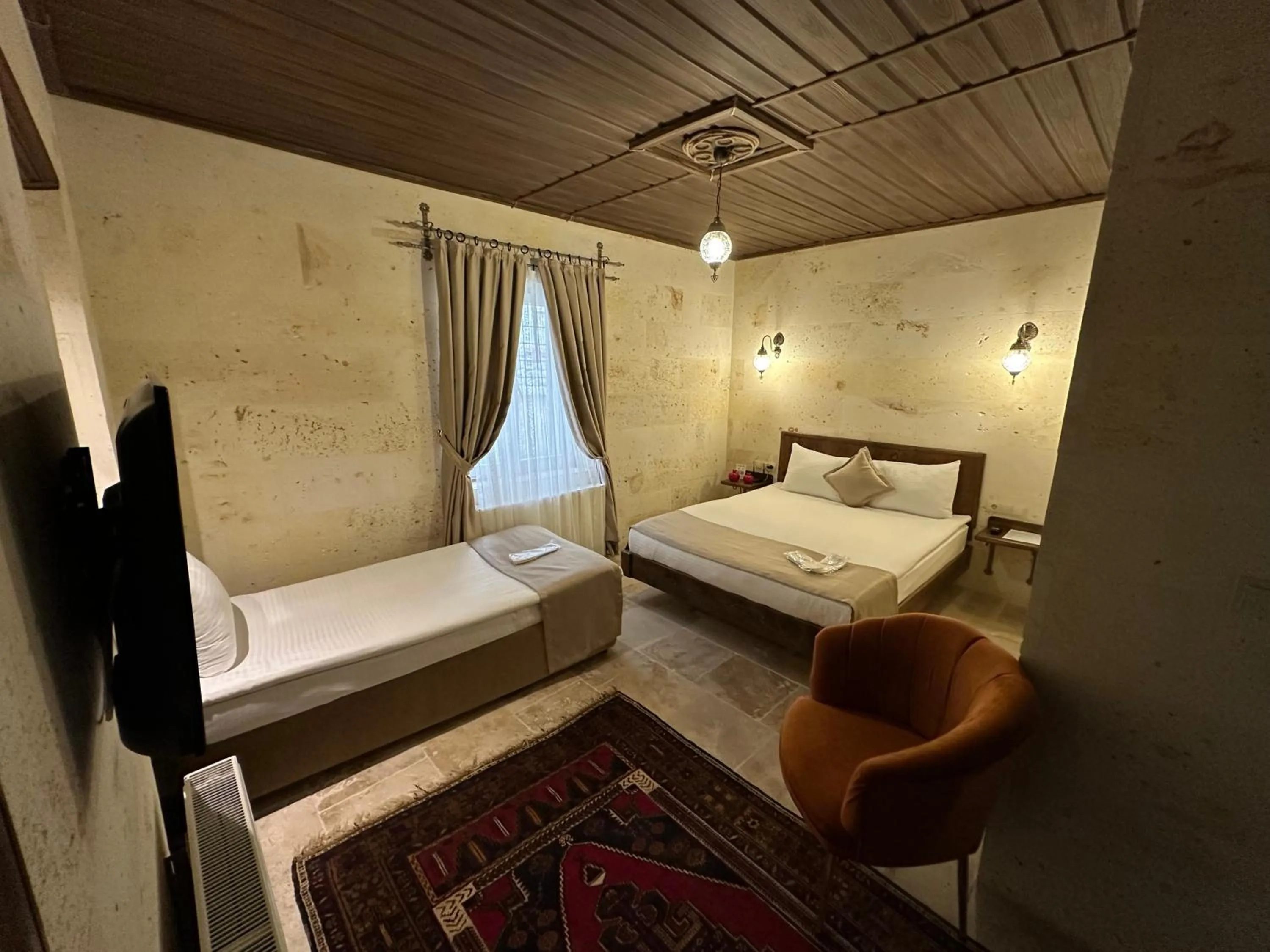 Bed in Virtus Cappadocia Hotel Göreme