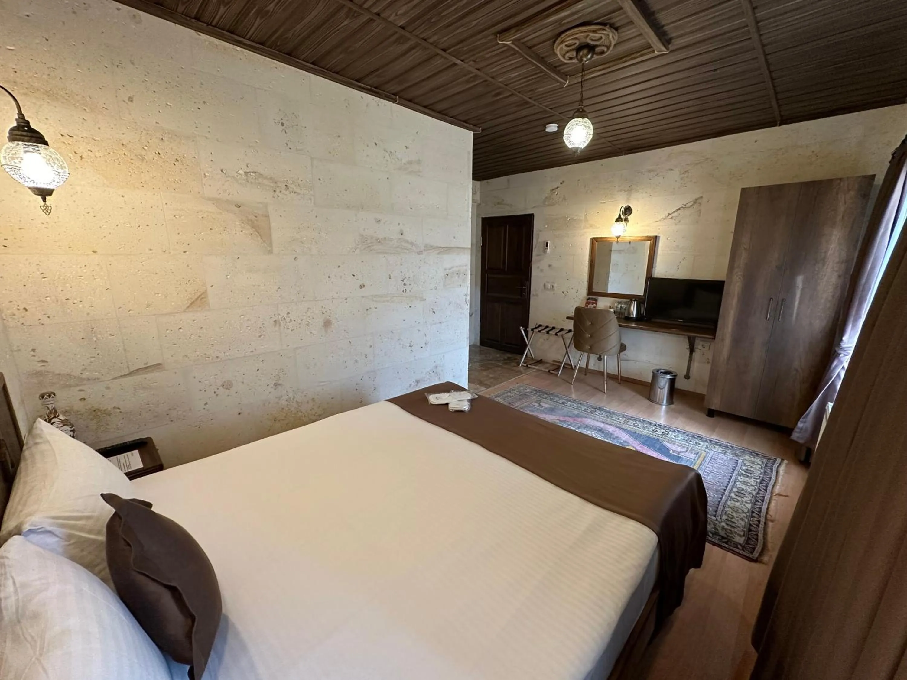 Bed in Virtus Cappadocia Hotel Göreme