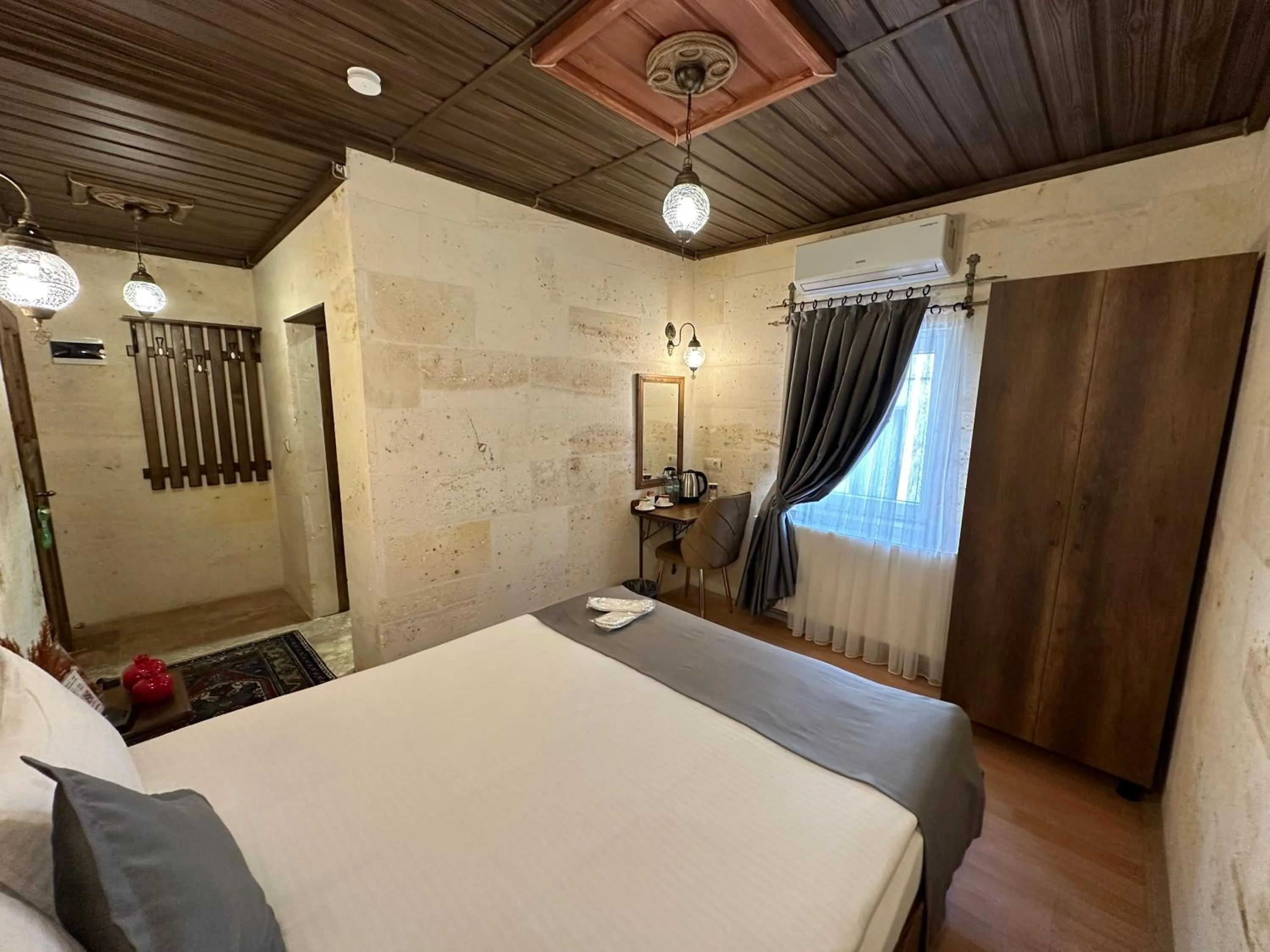 Bed in Virtus Cappadocia Hotel Göreme