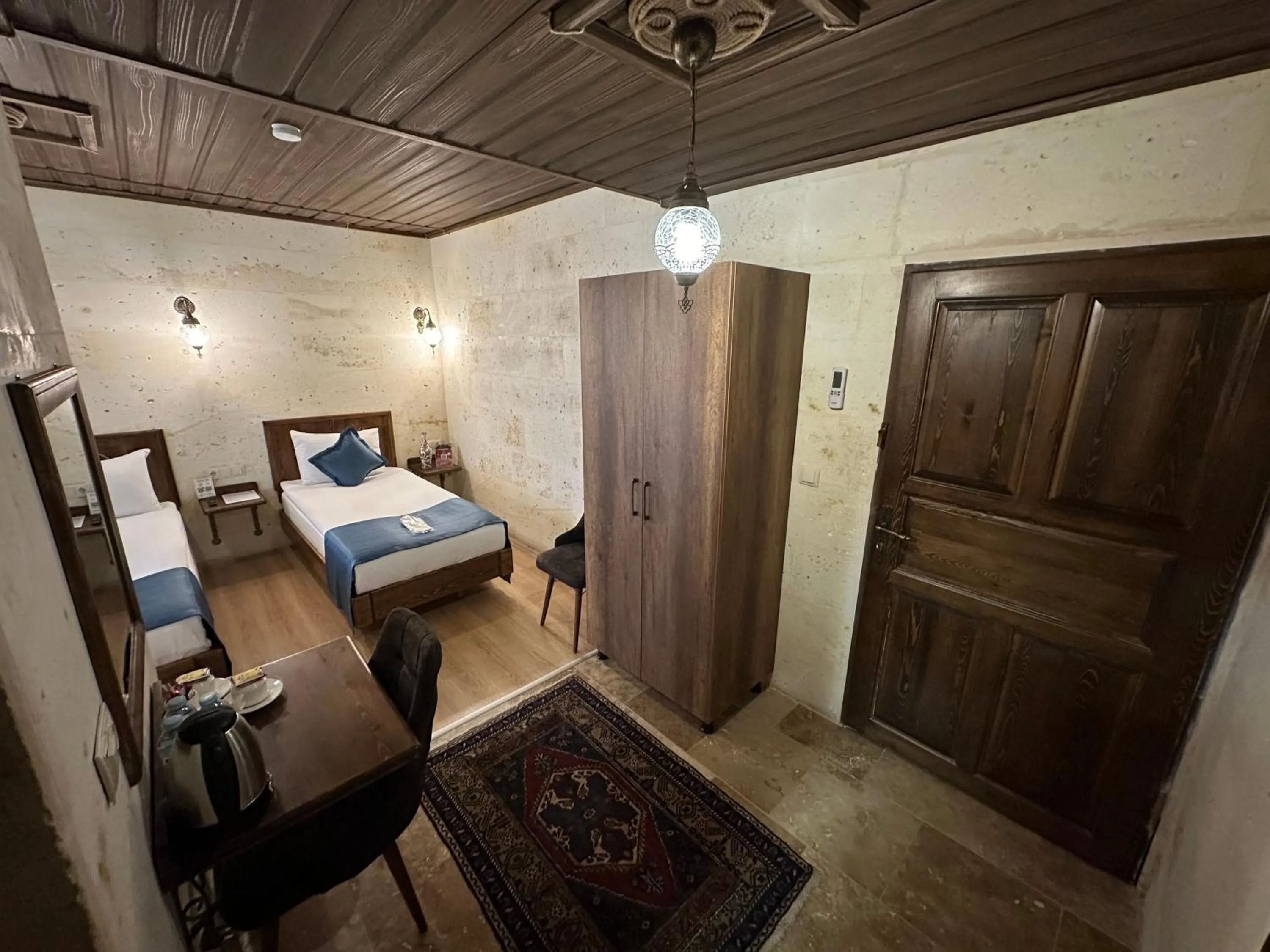 Bed in Virtus Cappadocia Hotel Göreme