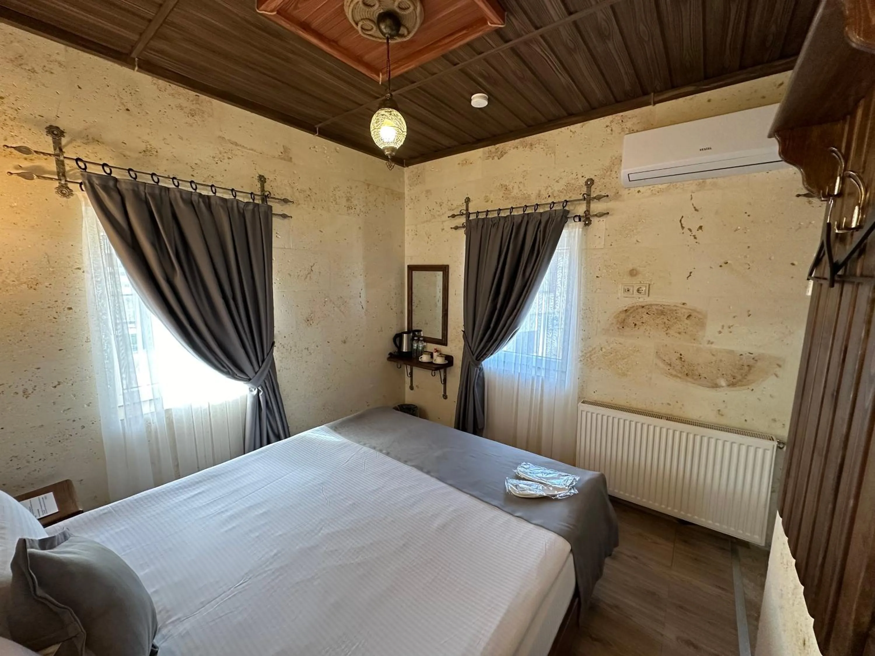 Bed in Virtus Cappadocia Hotel Göreme