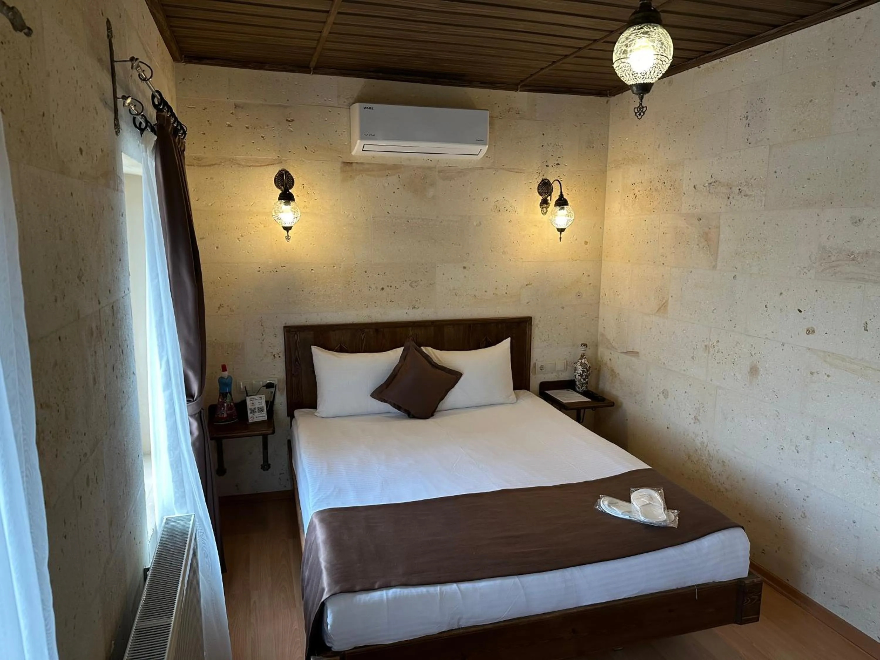 Bed in Virtus Cappadocia Hotel Göreme