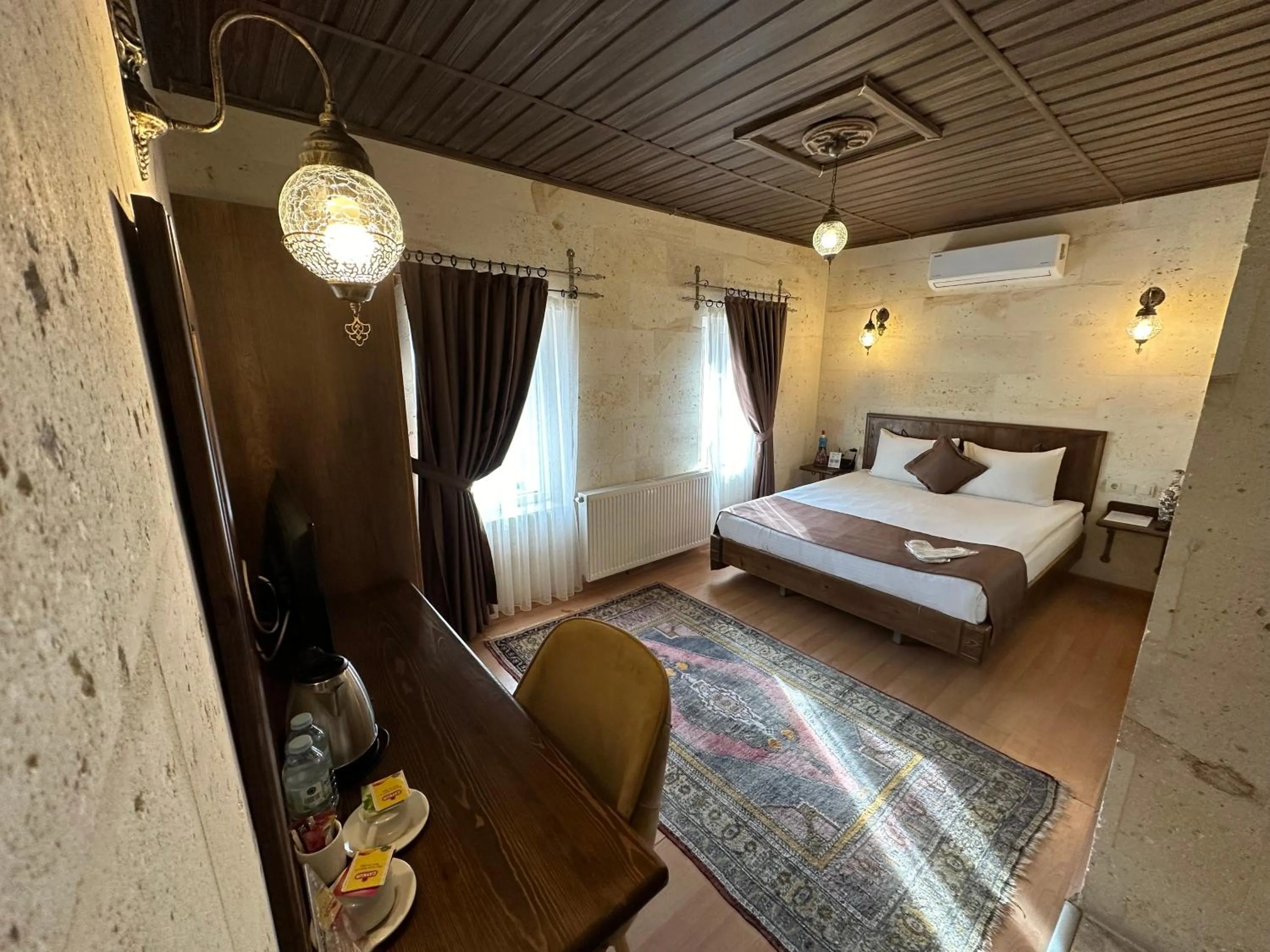 Bed in Virtus Cappadocia Hotel Göreme