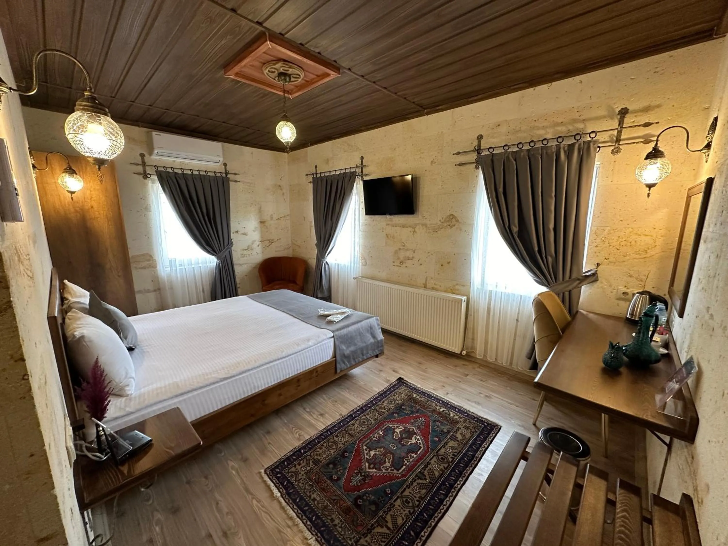 Bed in Virtus Cappadocia Hotel Göreme