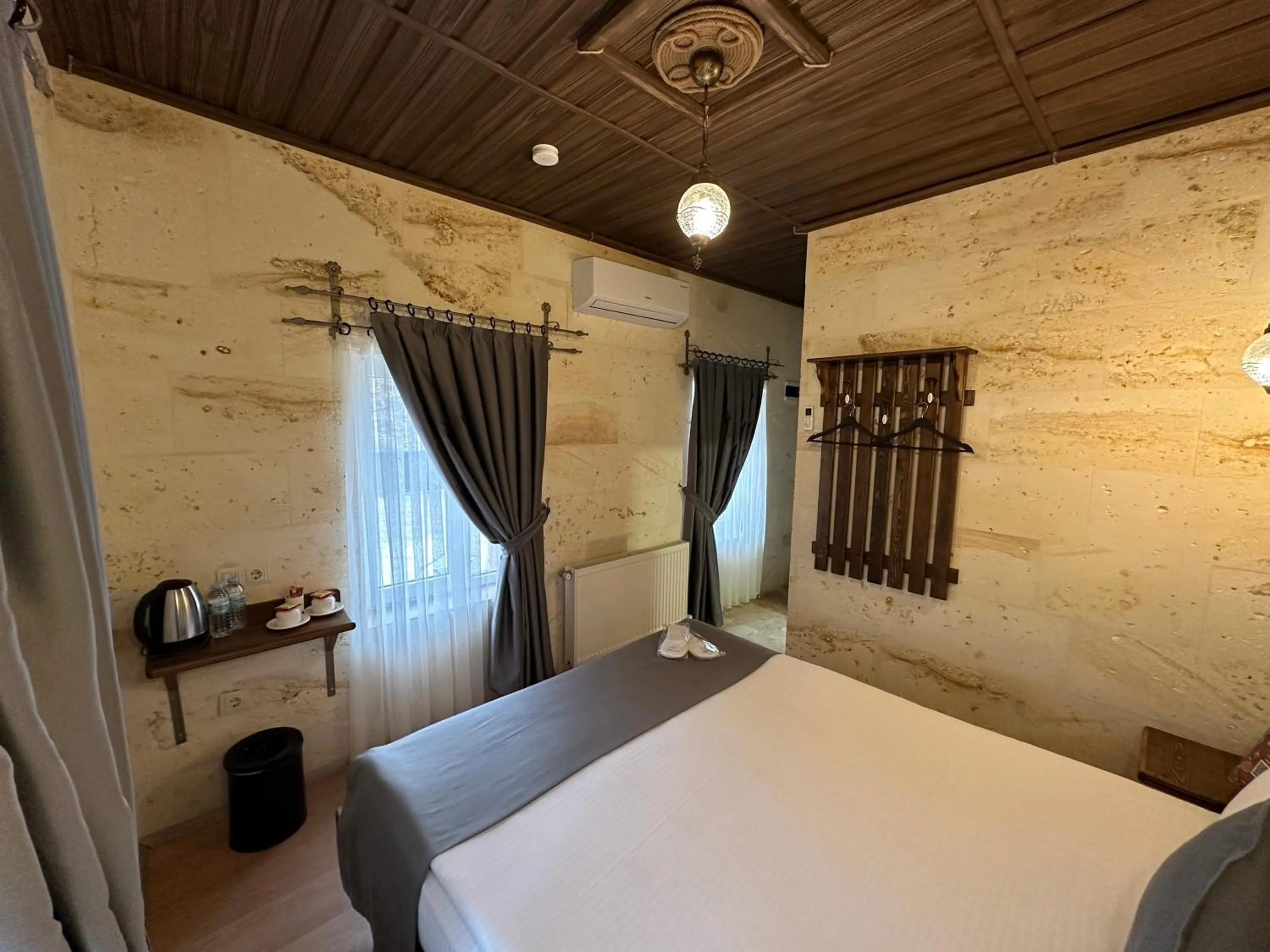 Bed in Virtus Cappadocia Hotel Göreme