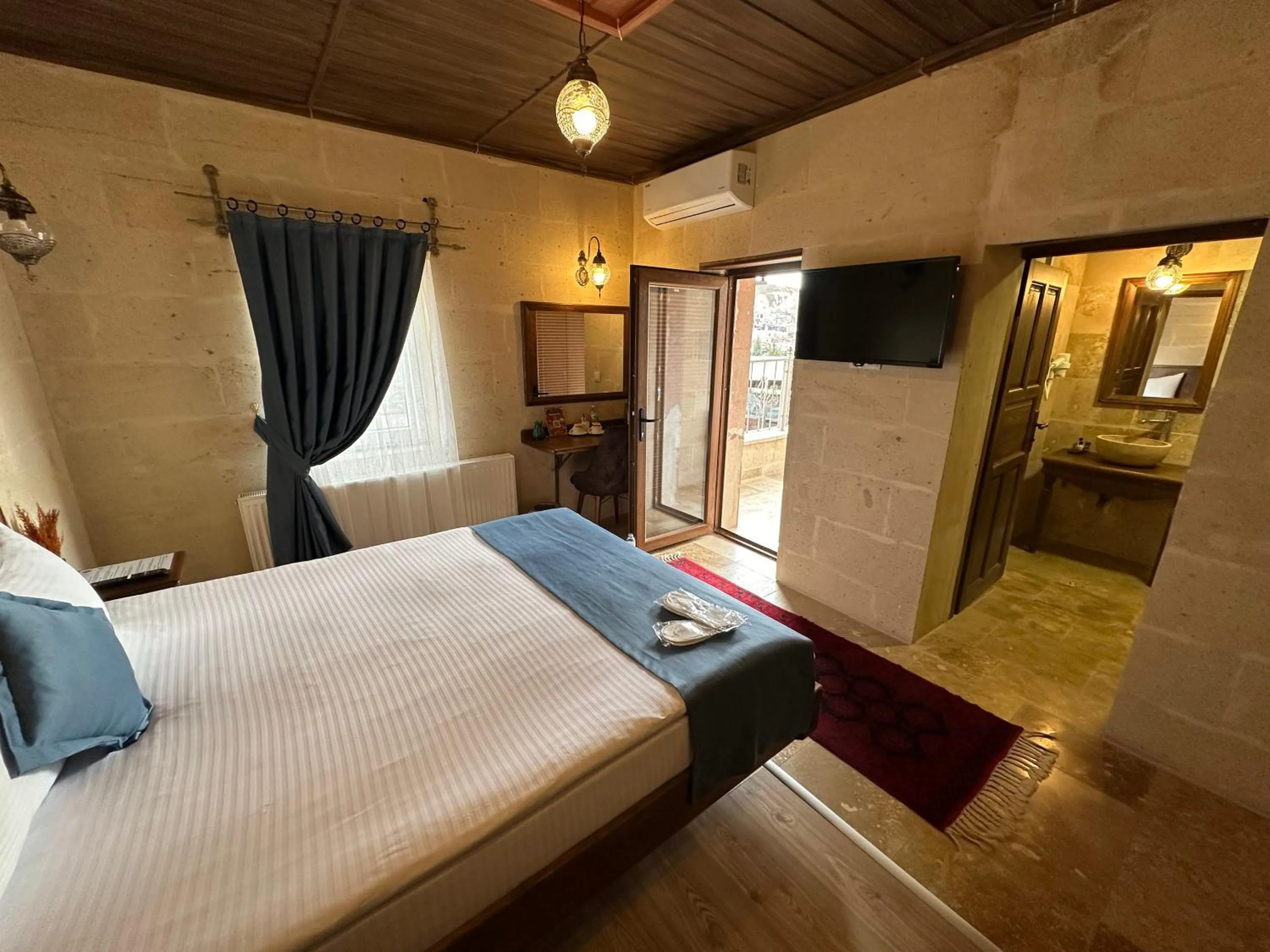 Bed in Virtus Cappadocia Hotel Göreme