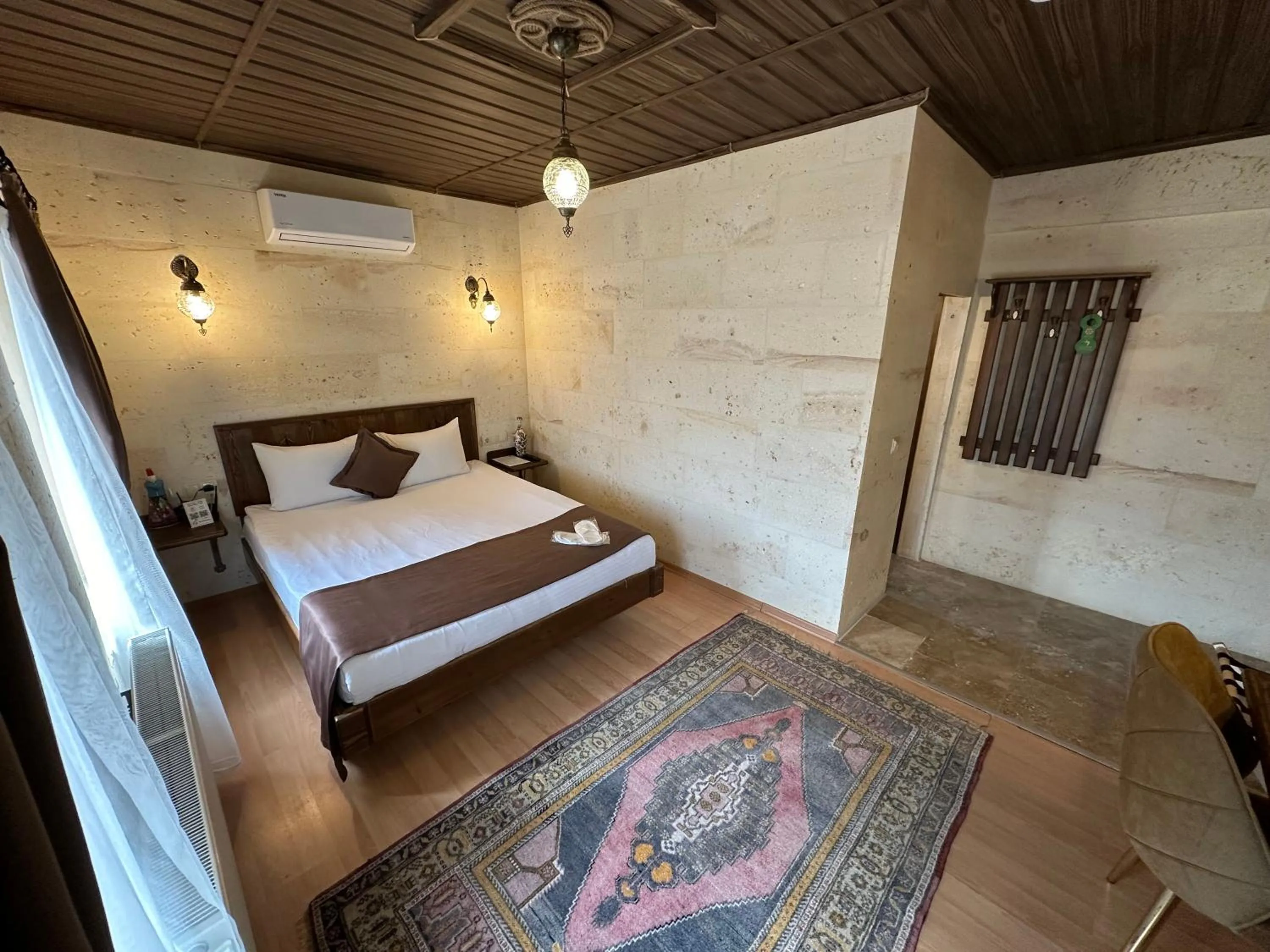 Bed in Virtus Cappadocia Hotel Göreme