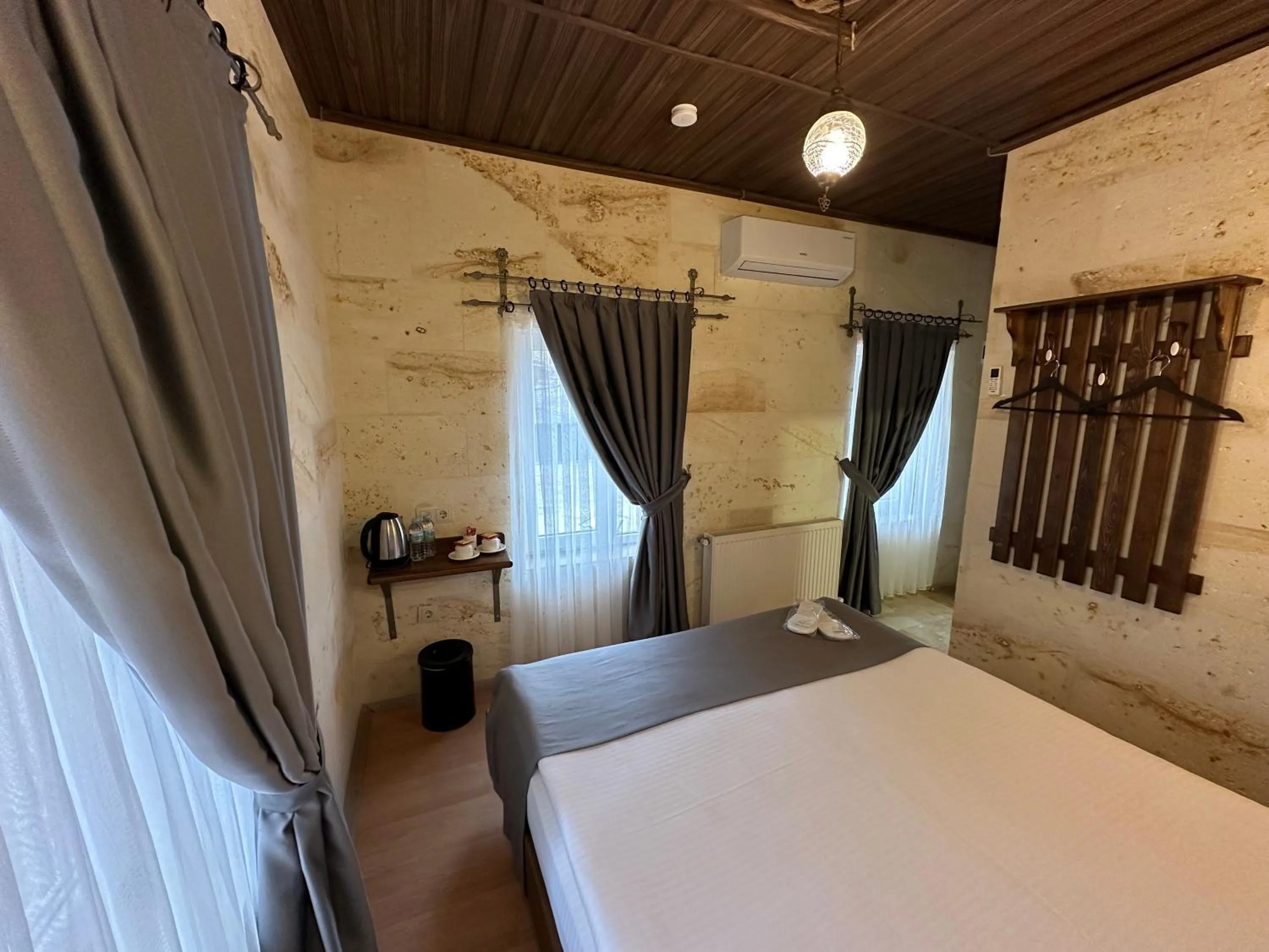 Bed in Virtus Cappadocia Hotel Göreme