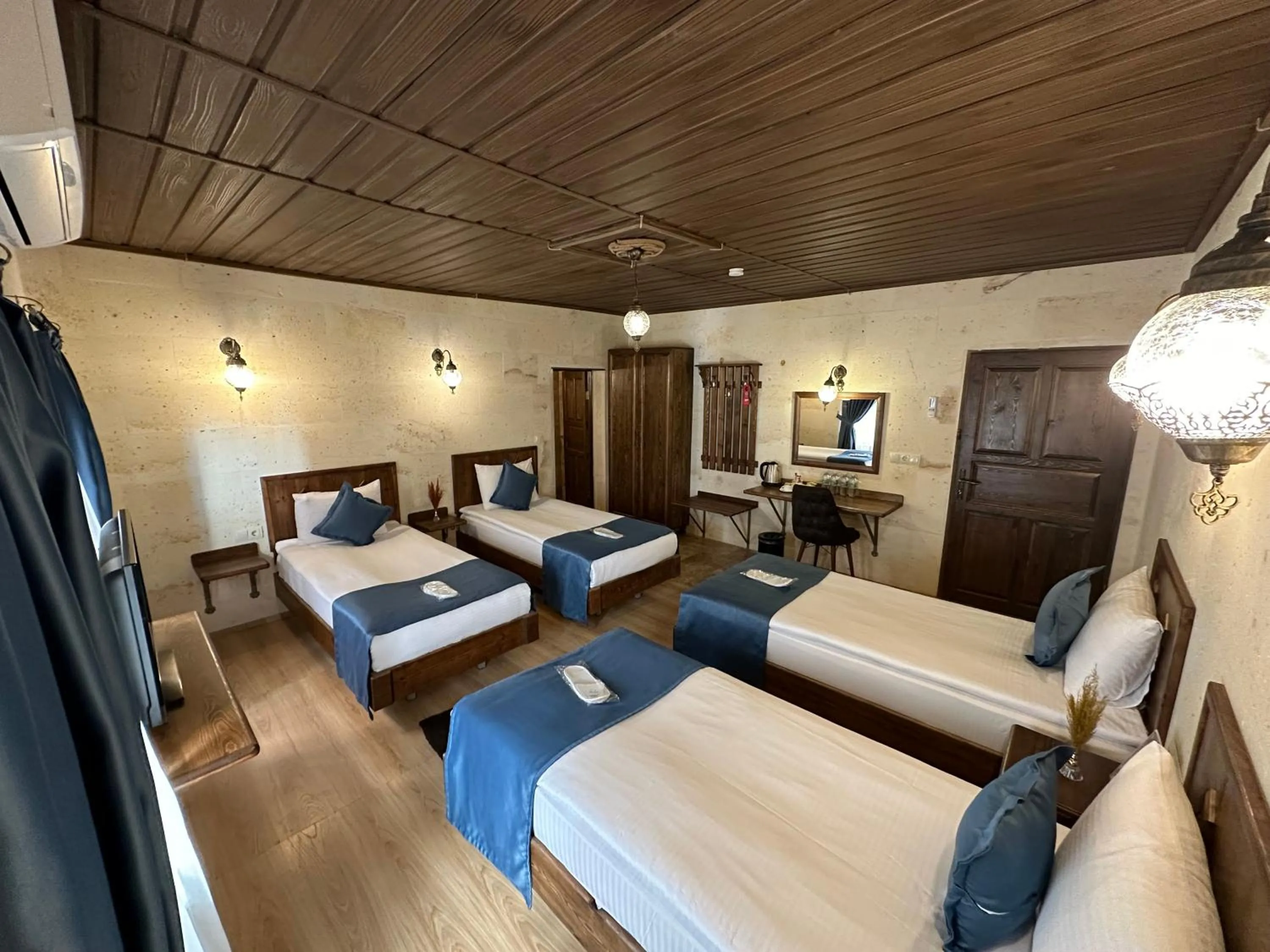 Bed in Virtus Cappadocia Hotel Göreme