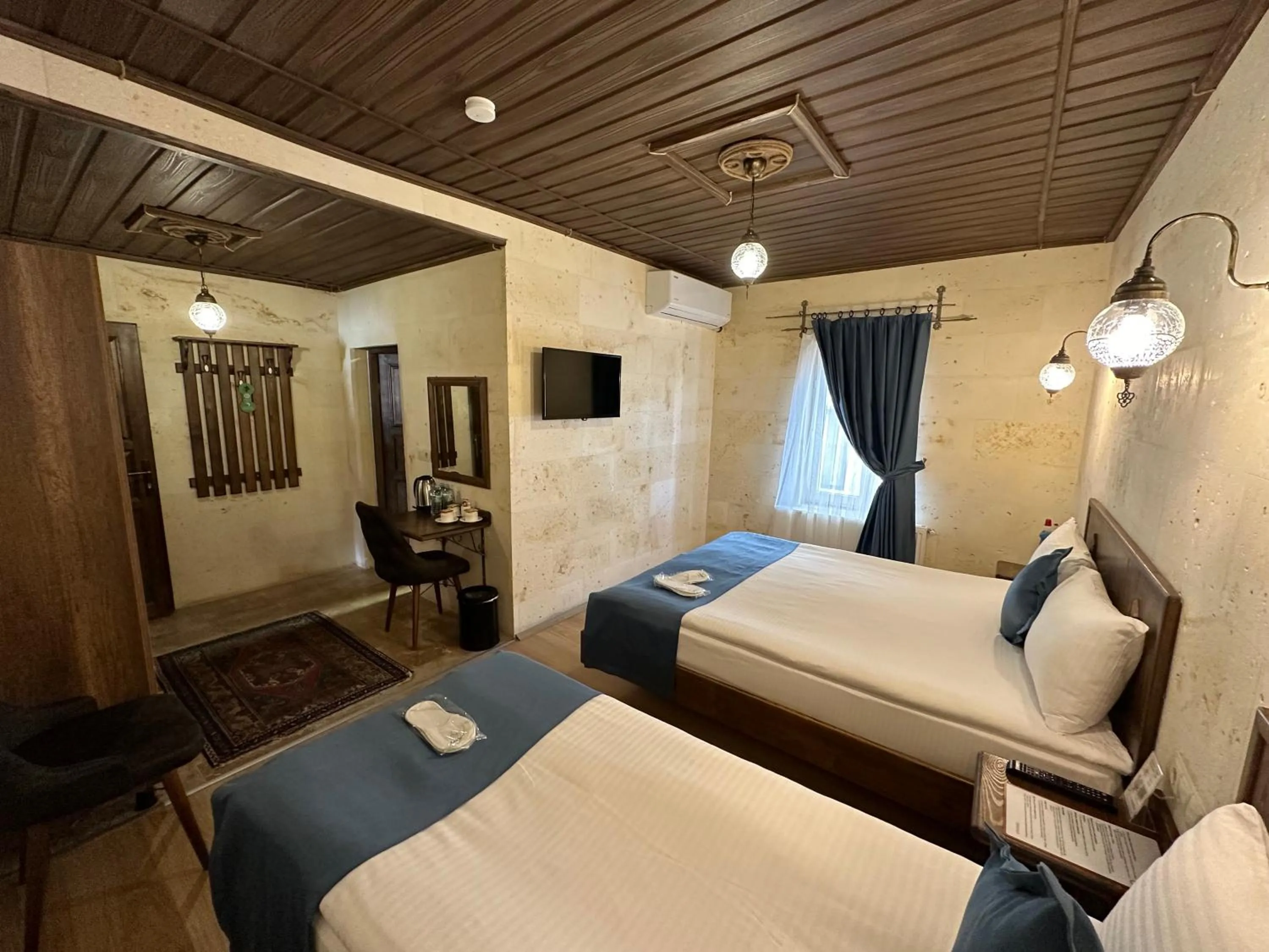 Bed in Virtus Cappadocia Hotel Göreme