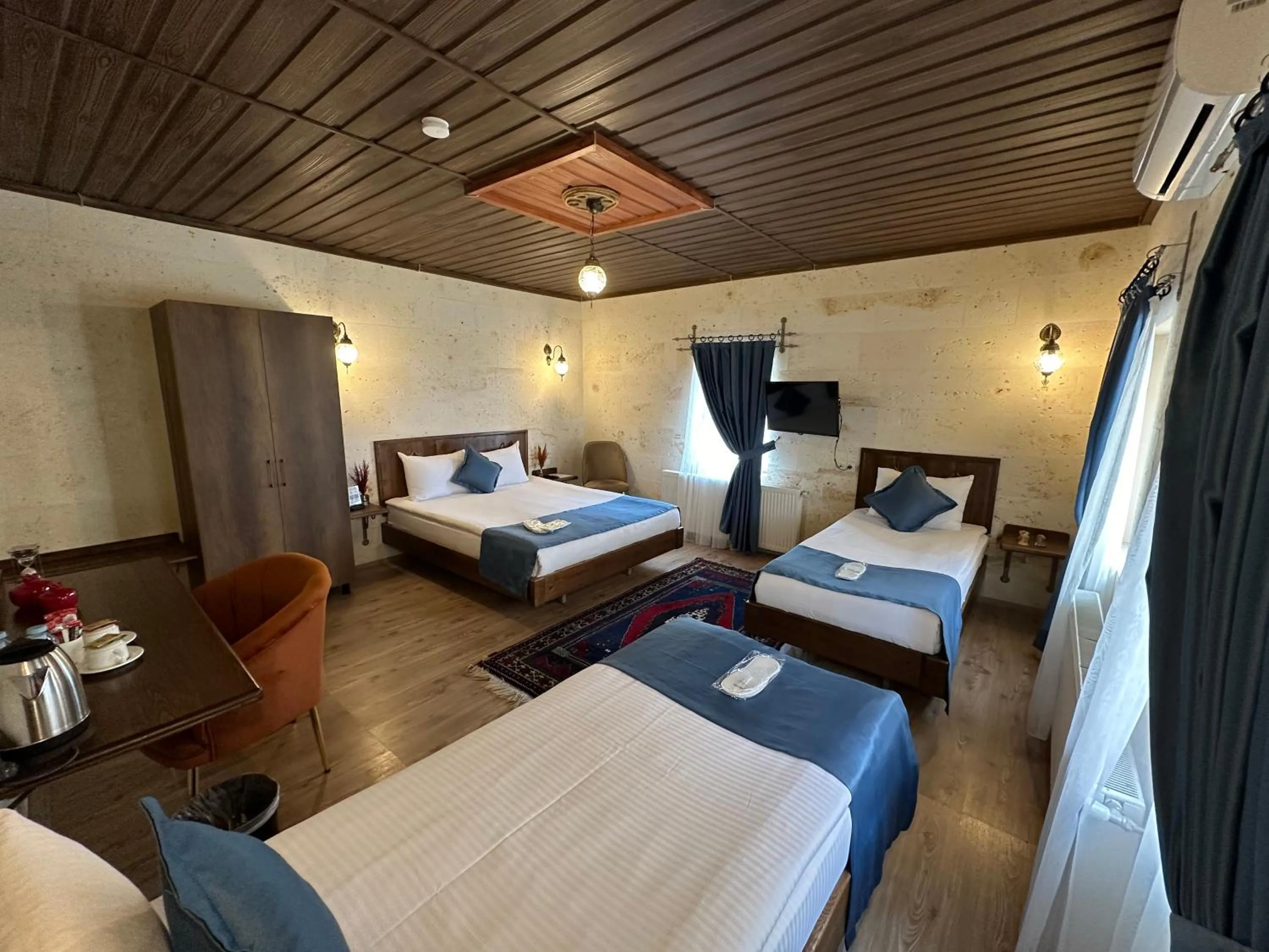 Bed in Virtus Cappadocia Hotel Göreme