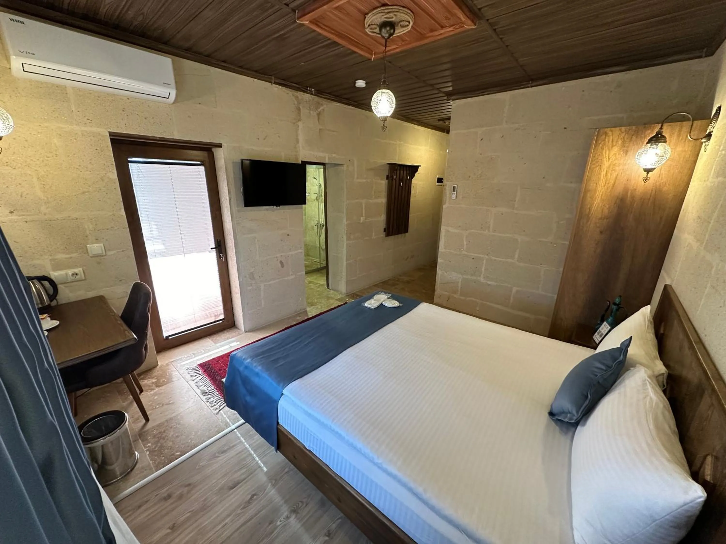 Bed in Virtus Cappadocia Hotel Göreme