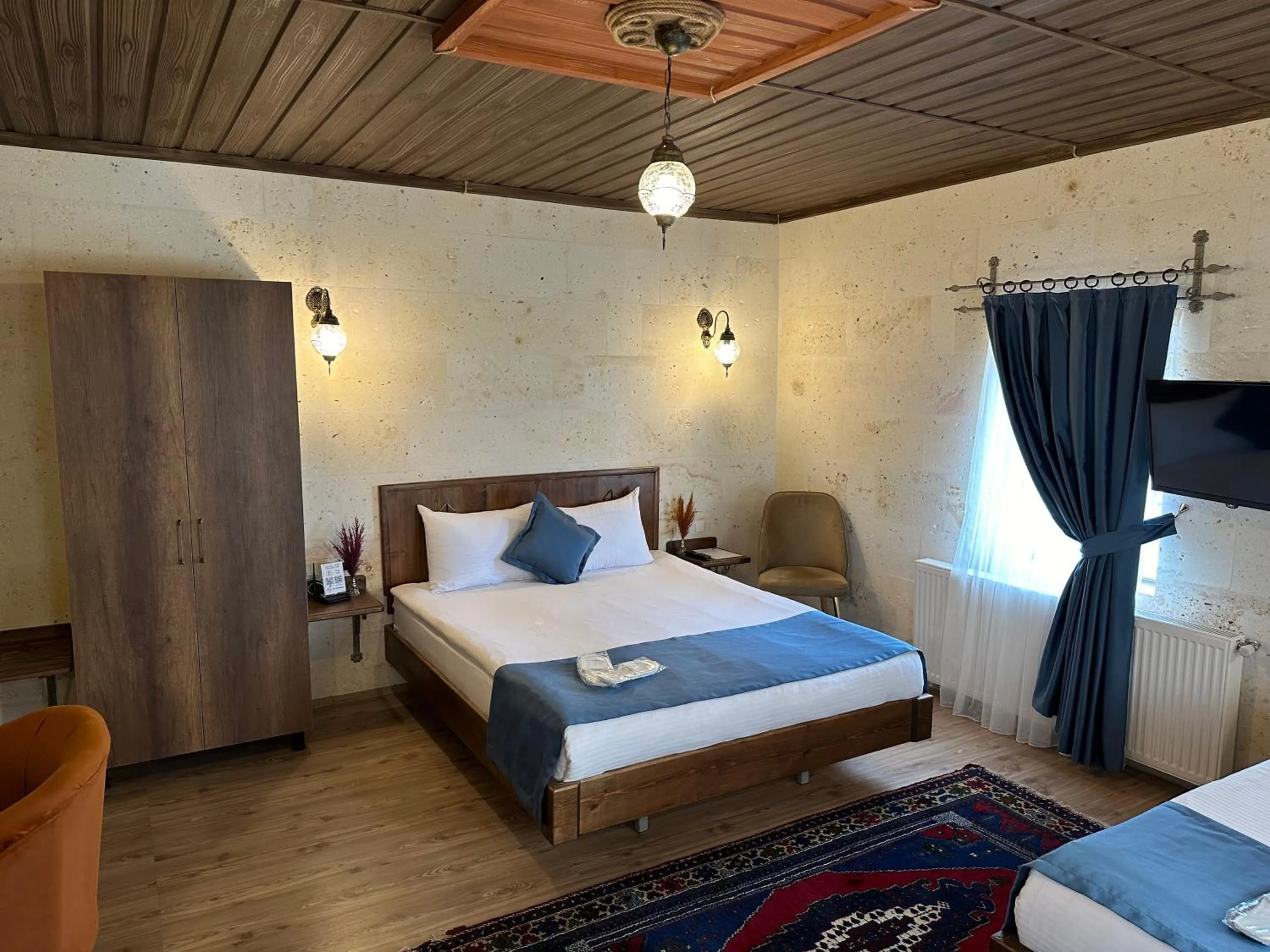 Bed in Virtus Cappadocia Hotel Göreme