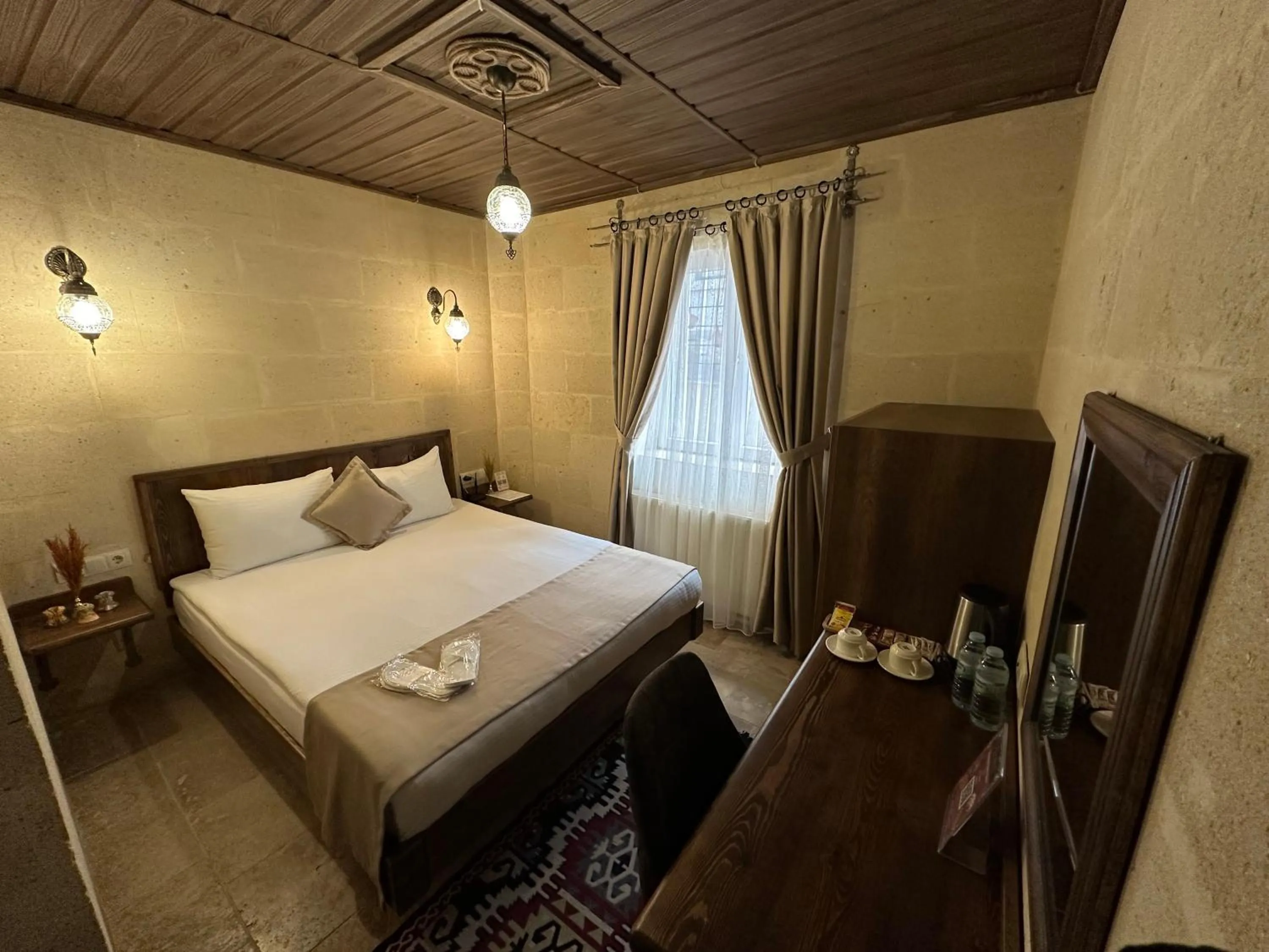 Bed in Virtus Cappadocia Hotel Göreme