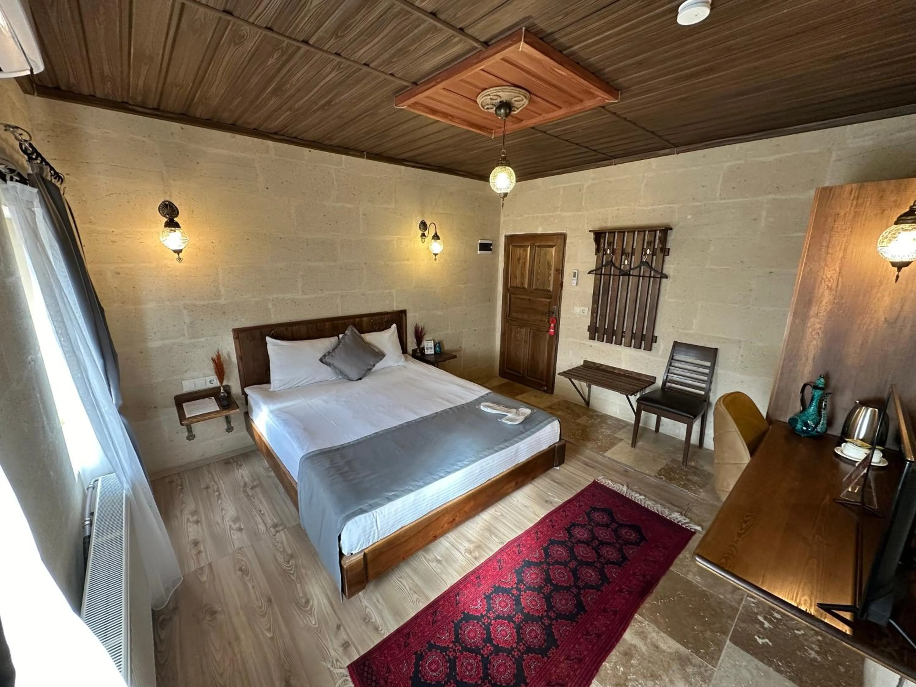 Bed in Virtus Cappadocia Hotel Göreme