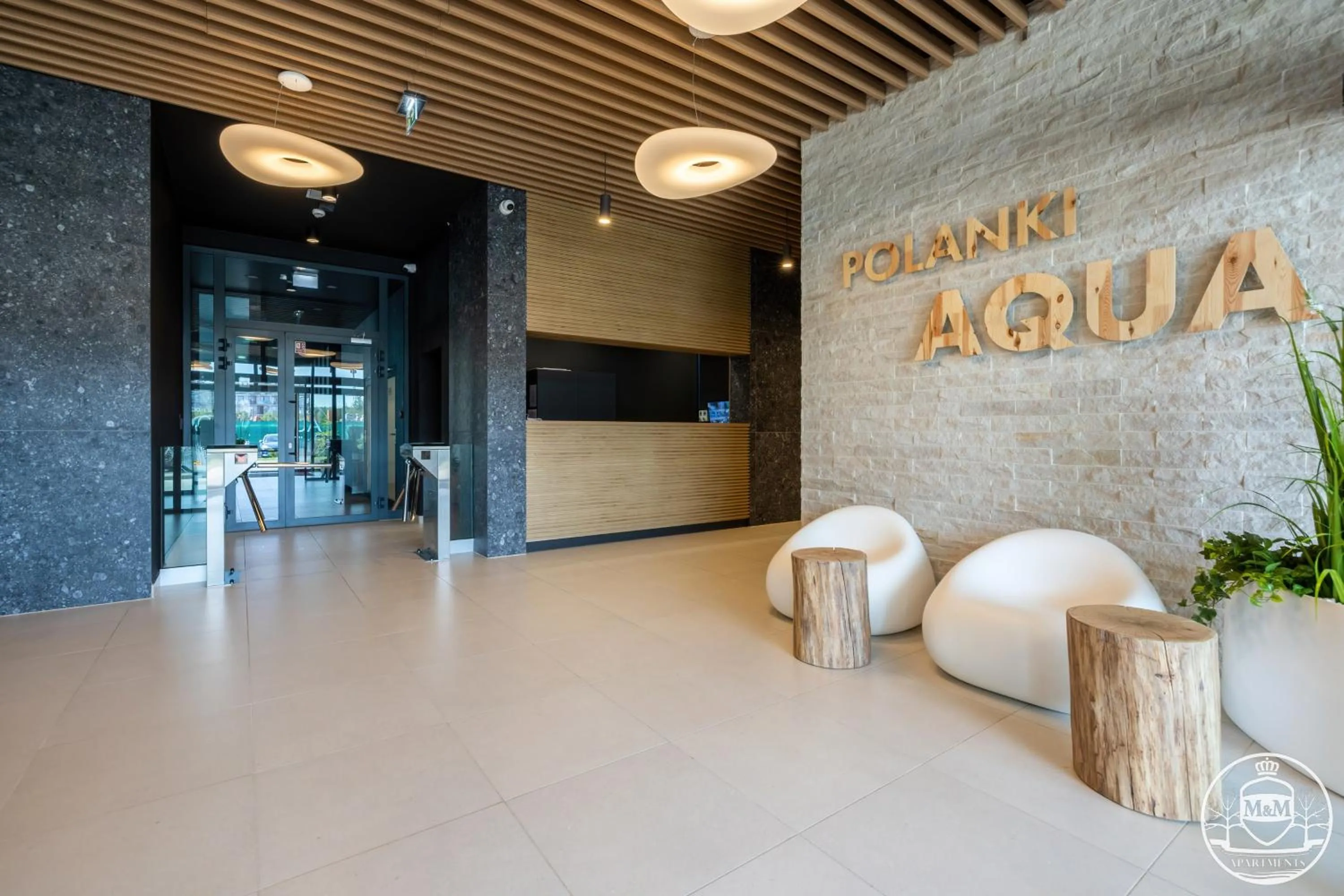 Property logo or sign in Polanki Aqua - Aquapark, Free Parking, Apartments M&M Kołobrzeg