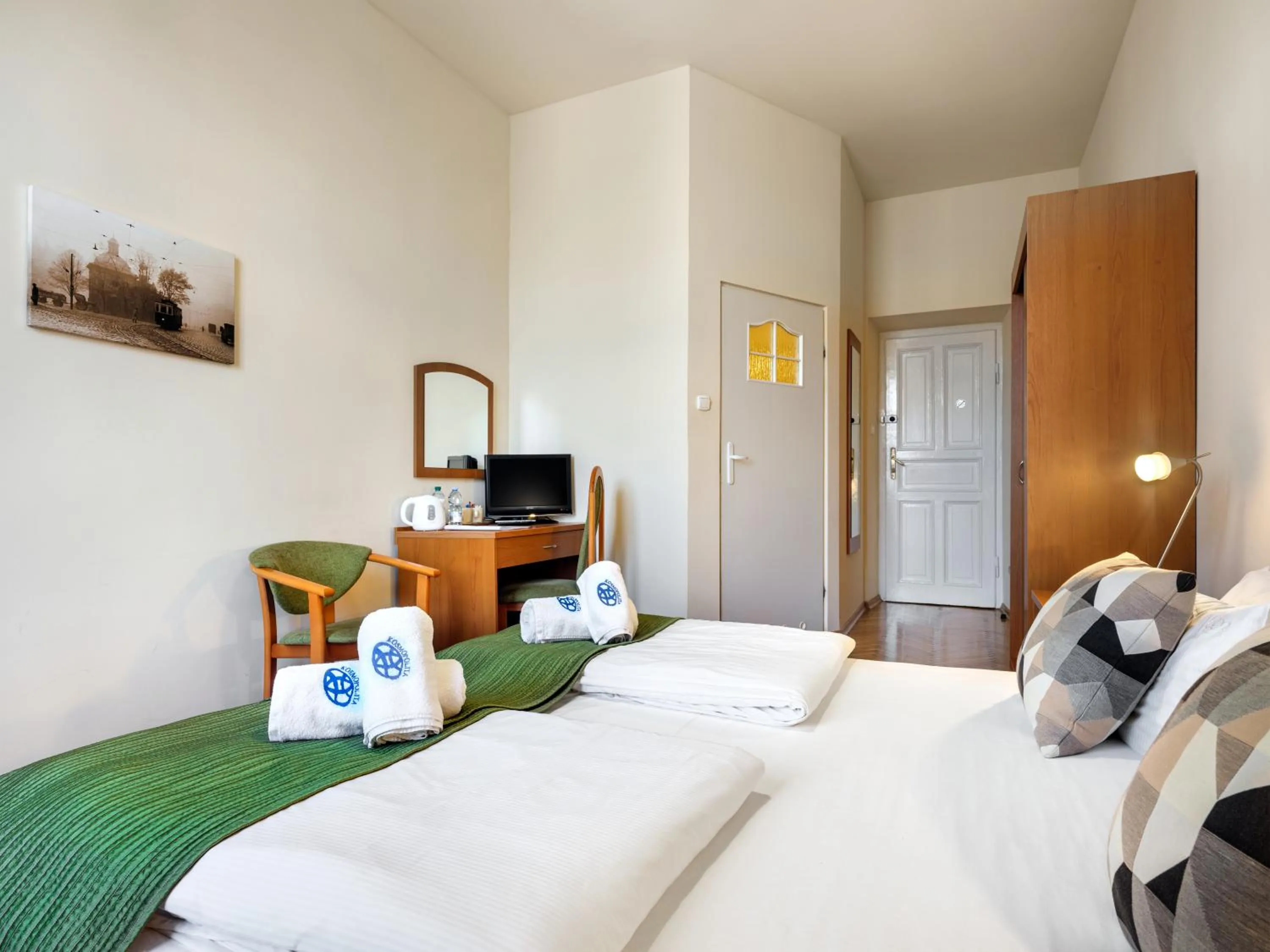 Bed in Kosmopolita Rooms