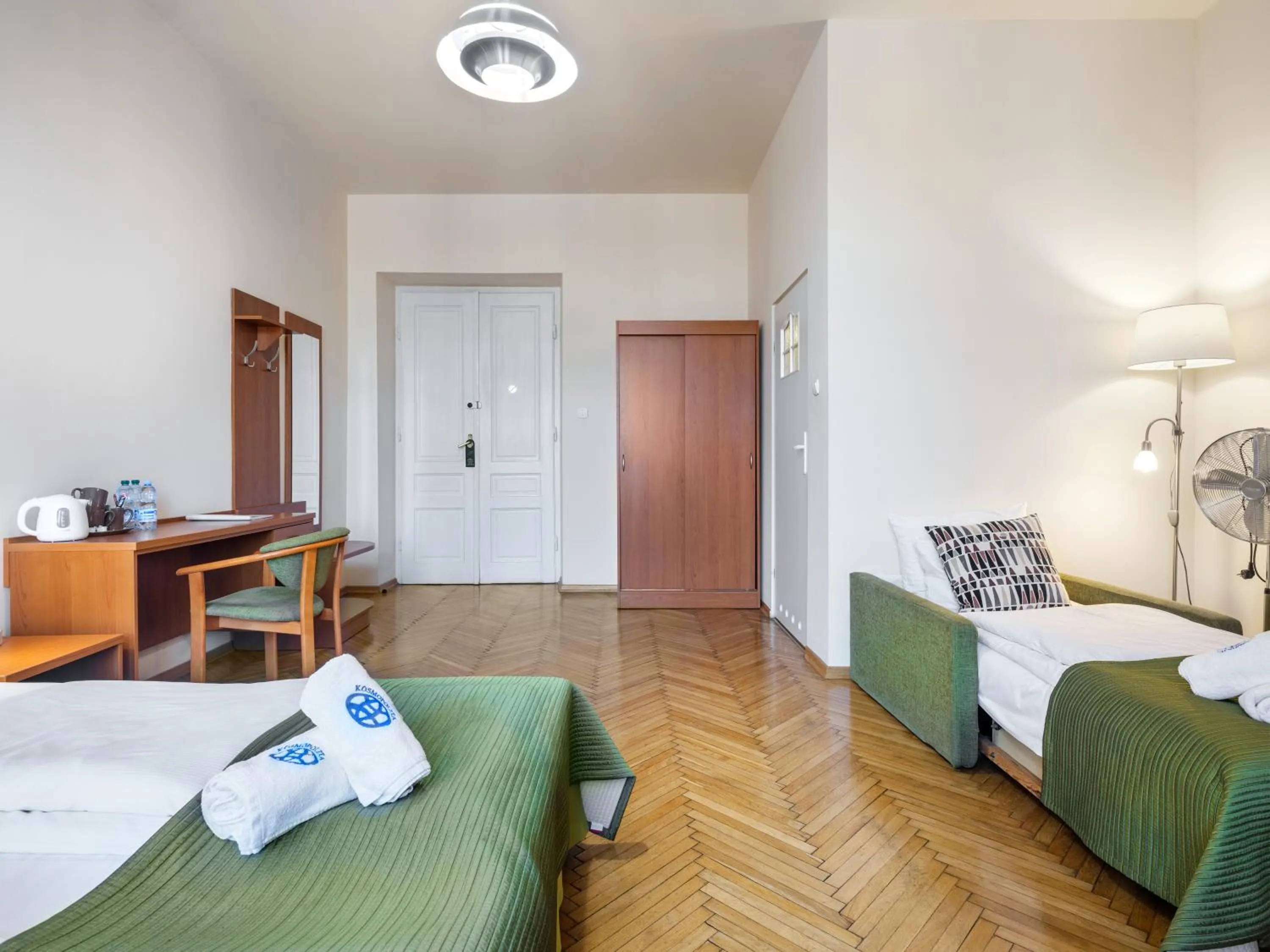 Bed in Kosmopolita Rooms