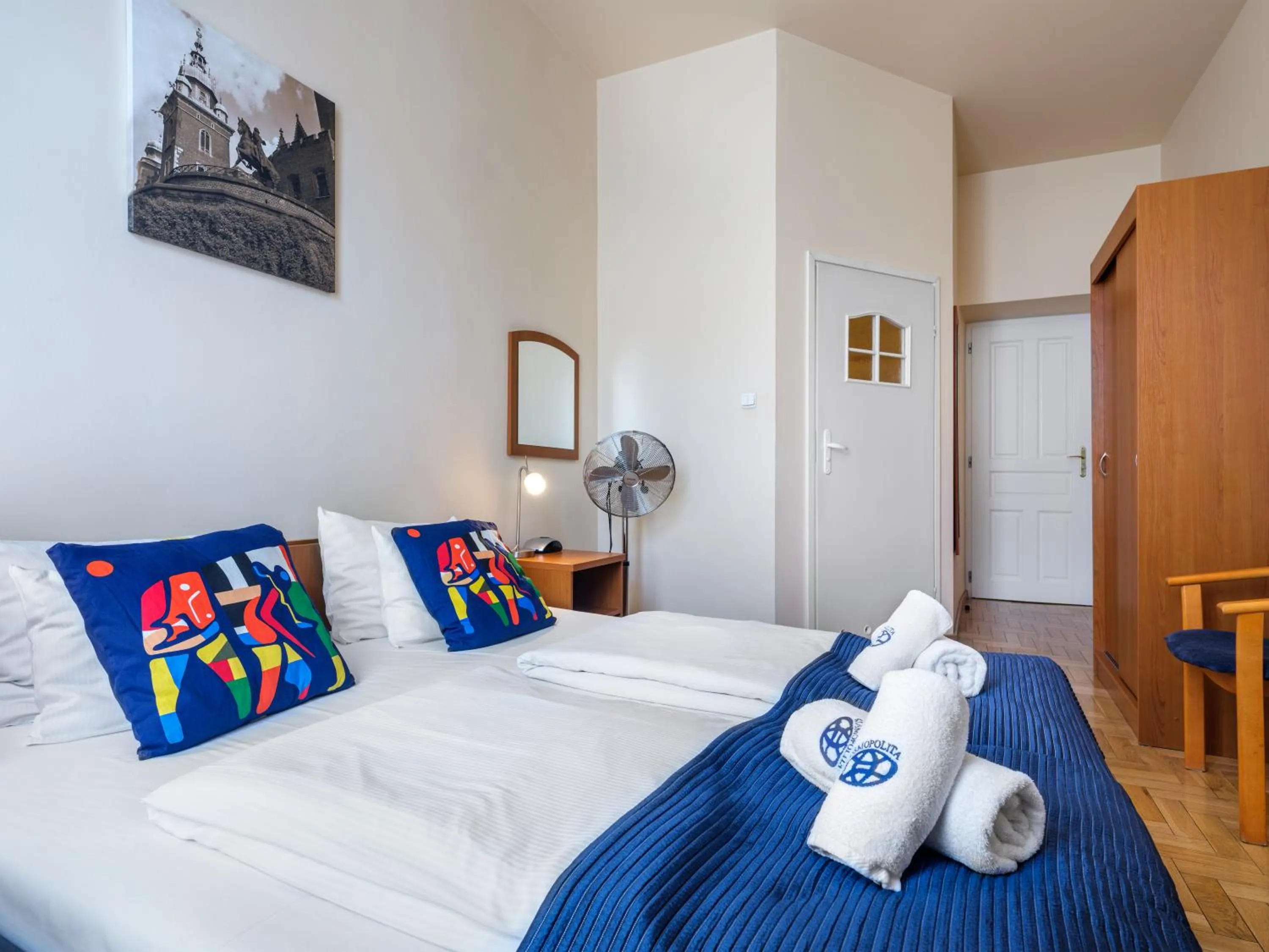 Bed in Kosmopolita Rooms